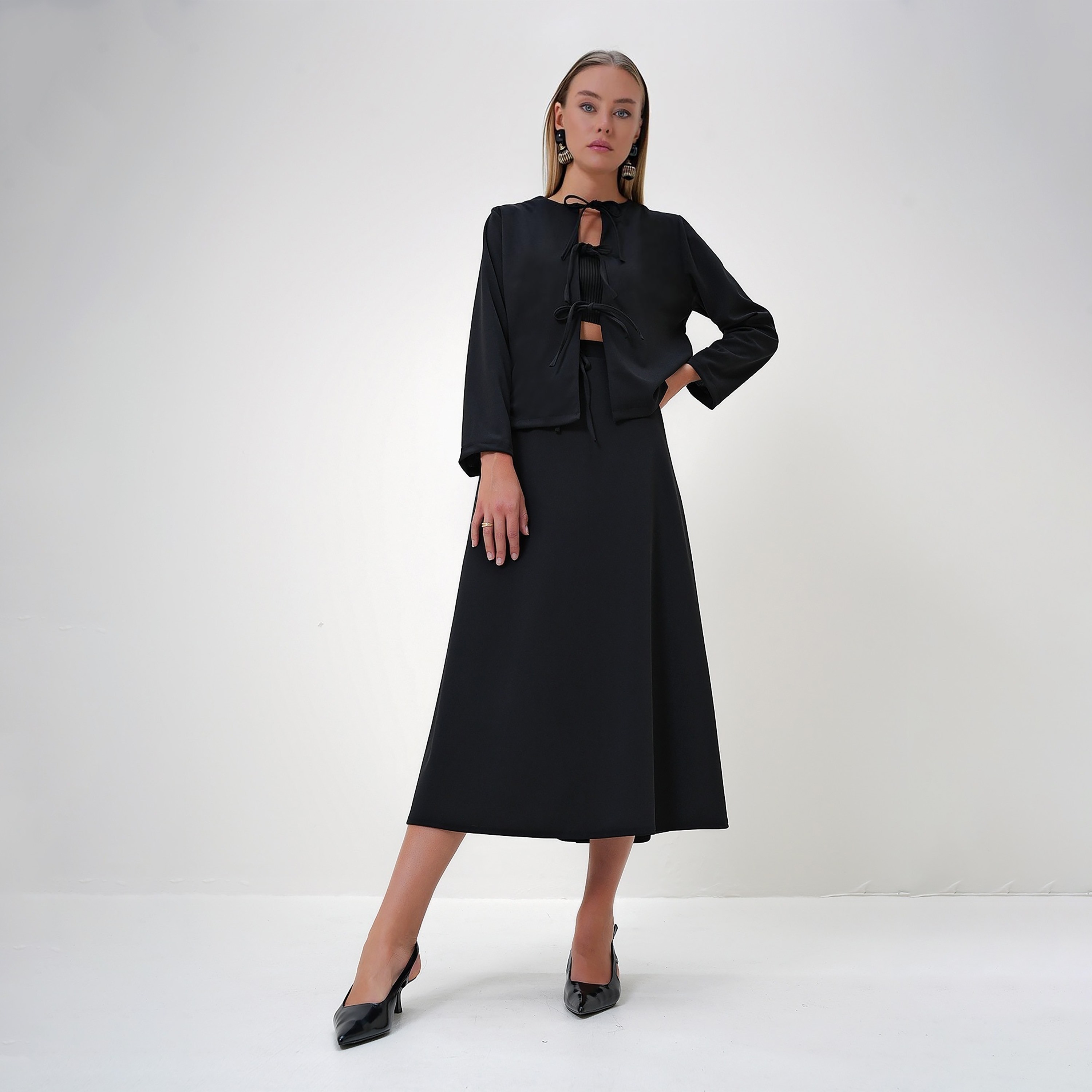 تريند ألاجاتي ستايل طقم نسائي متناسق من قطعتين: توب سادة برقبة دائرية وتنورة-women-clothing-coordsets-image-1