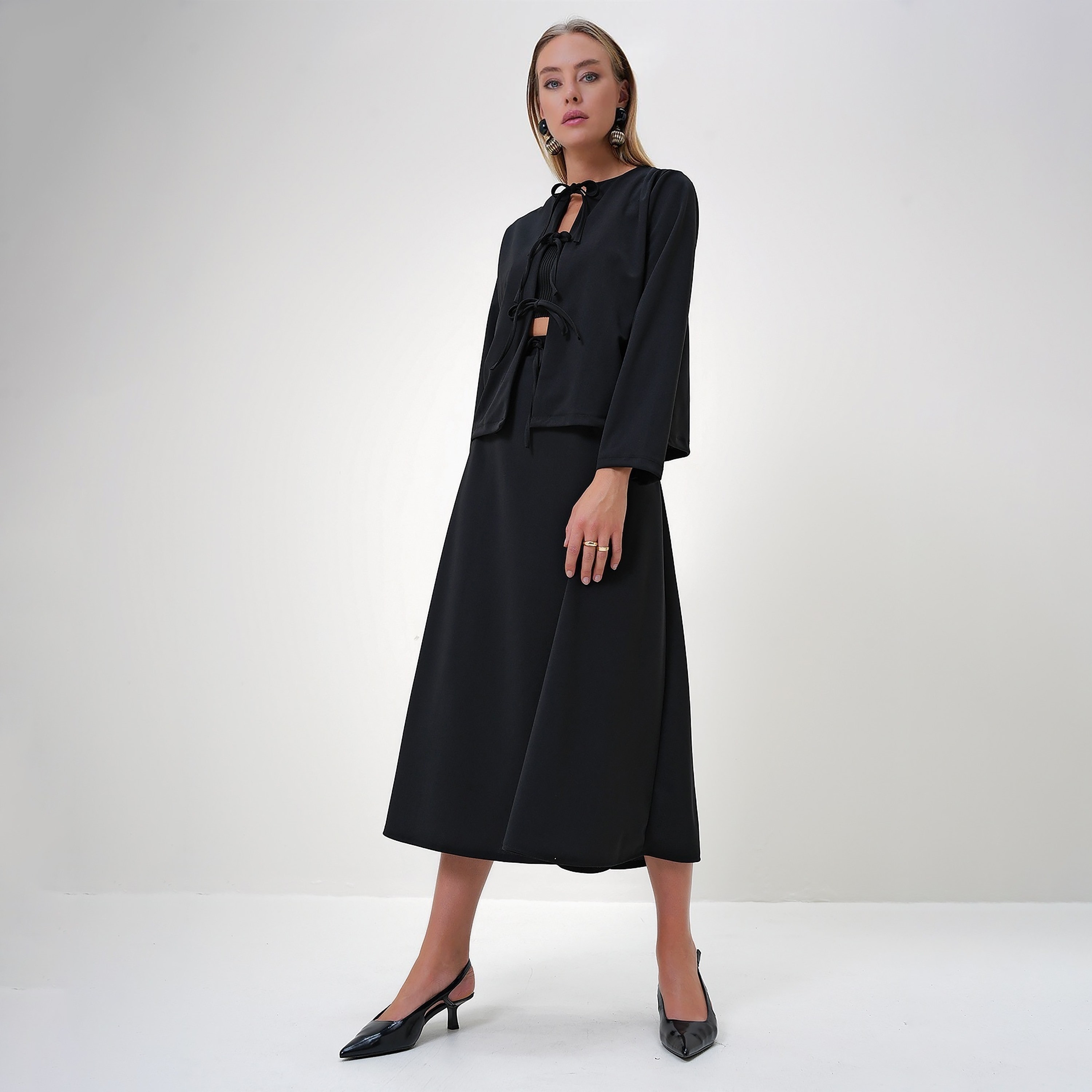 تريند ألاجاتي ستايل طقم نسائي متناسق من قطعتين: توب سادة برقبة دائرية وتنورة-women-clothing-coordsets-image-2