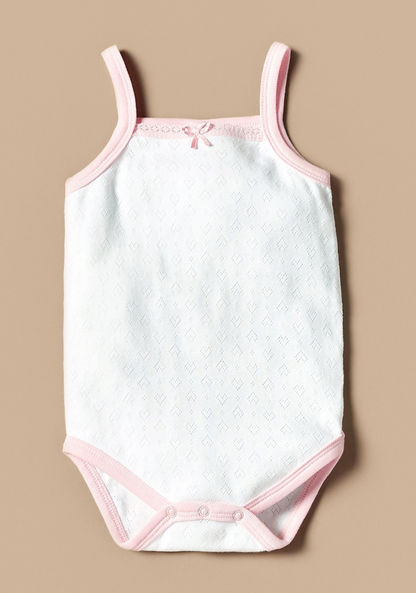 Juniors Strappy Textured Bodysuit with Bow Detail