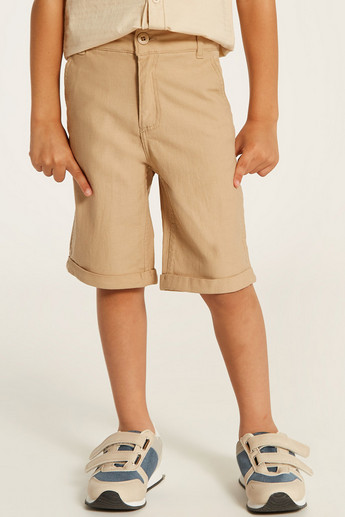 Juniors Solid Mid-Rise Shorts with Pockets and Button Closure