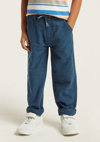 Solid Woven Pants with Pocket Detail and Button Closure