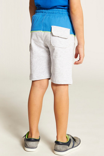 XYZ Text Embossed Shorts with Flap Pockets