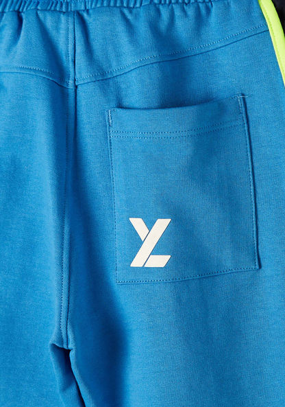 XYZ Printed Shorts with Drawstring Closure and Pocket
