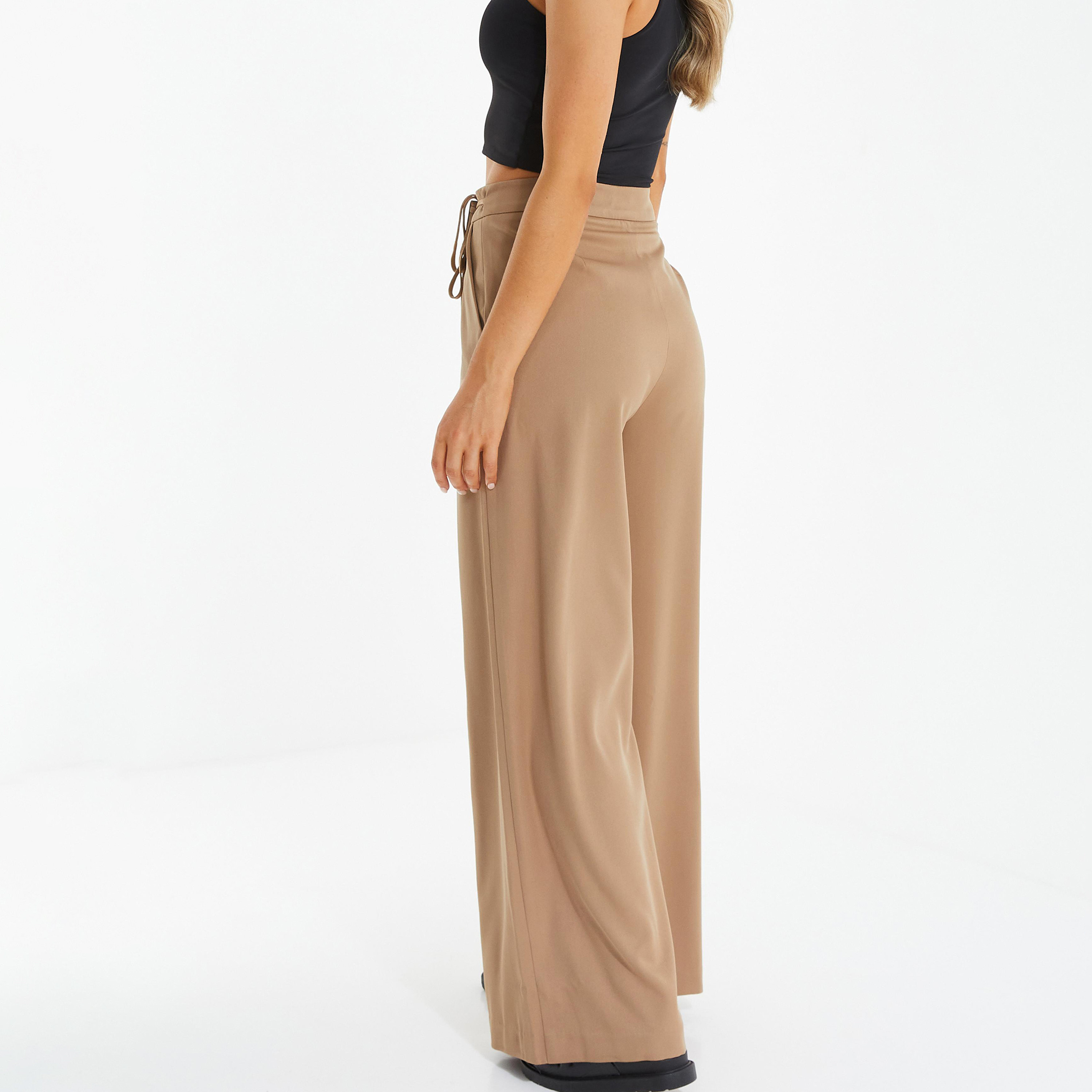 سروال رياضي سادة بخصر مرتفع ورجال واسع مع تفاصيل ربط جانبية من كويز-women-clothing-bottoms-trousers-image-4