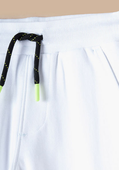XYZ Printed Jog Pants with Drawstring Closure and Pockets