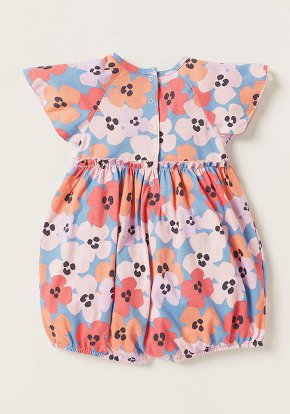 Juniors All Over Print Romper with Round Neck and Button Closure