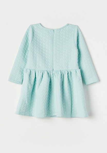 Juniors Textured Dress with Long Sleeves and Bow Detail