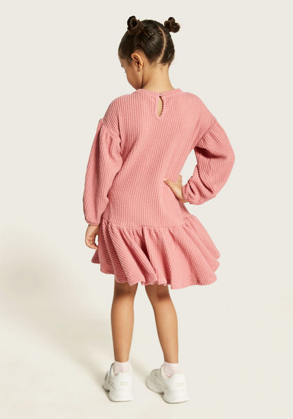 Juniors Textured Dress with Bow Accent and Flounce Hem
