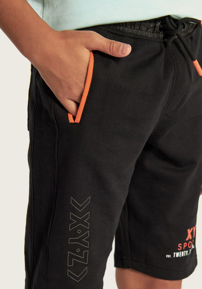 XYZ Printed Knit Shorts with Drawstring and Pocket Detail