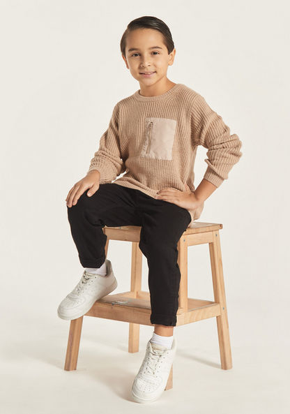 Eligo Textured Round Neck Pullover with Long Sleeves and Zip Pocket