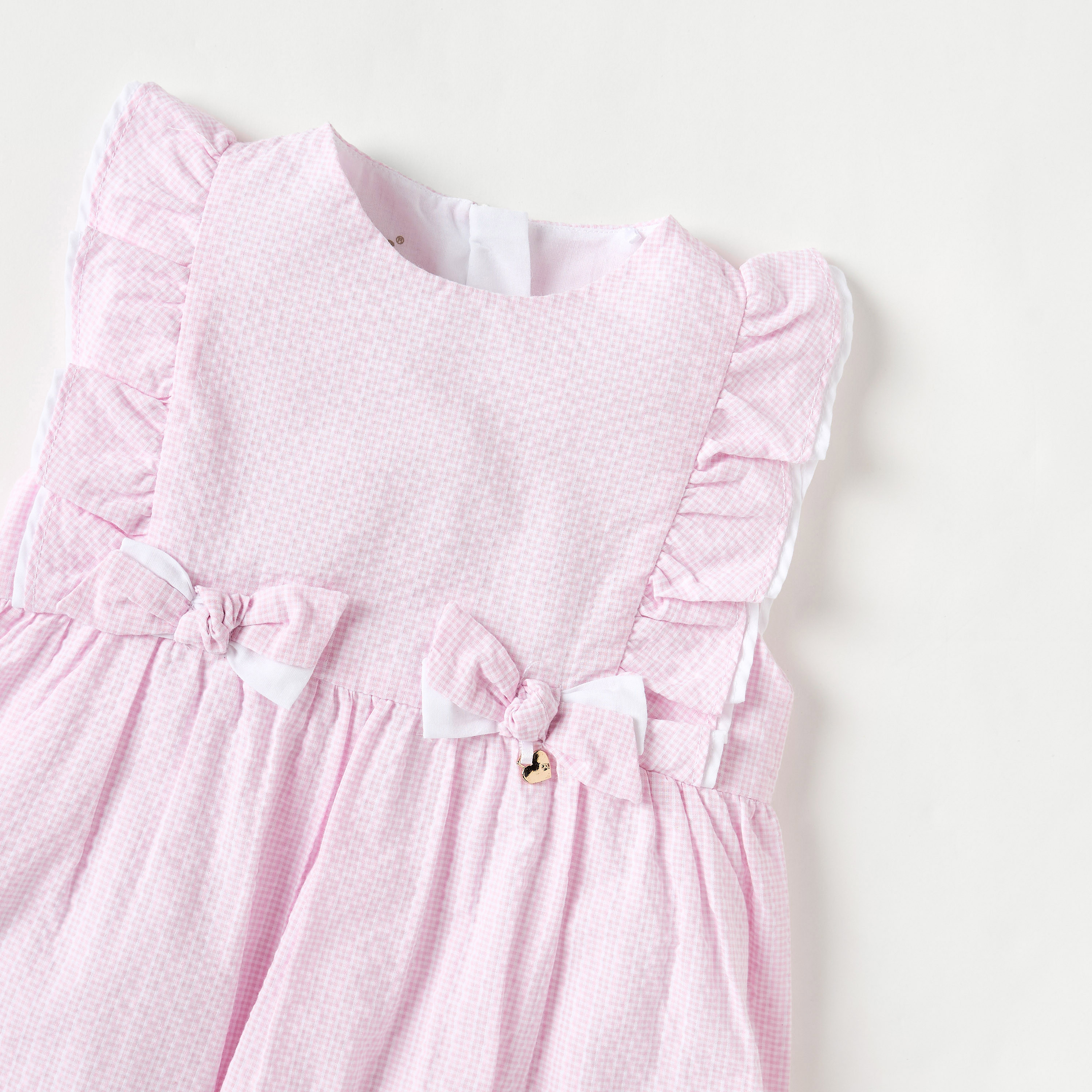 Giggles Textured Sleeveless Romper with Bow and Ruffle Detail-baby-girls-clothing-rompers-image-3