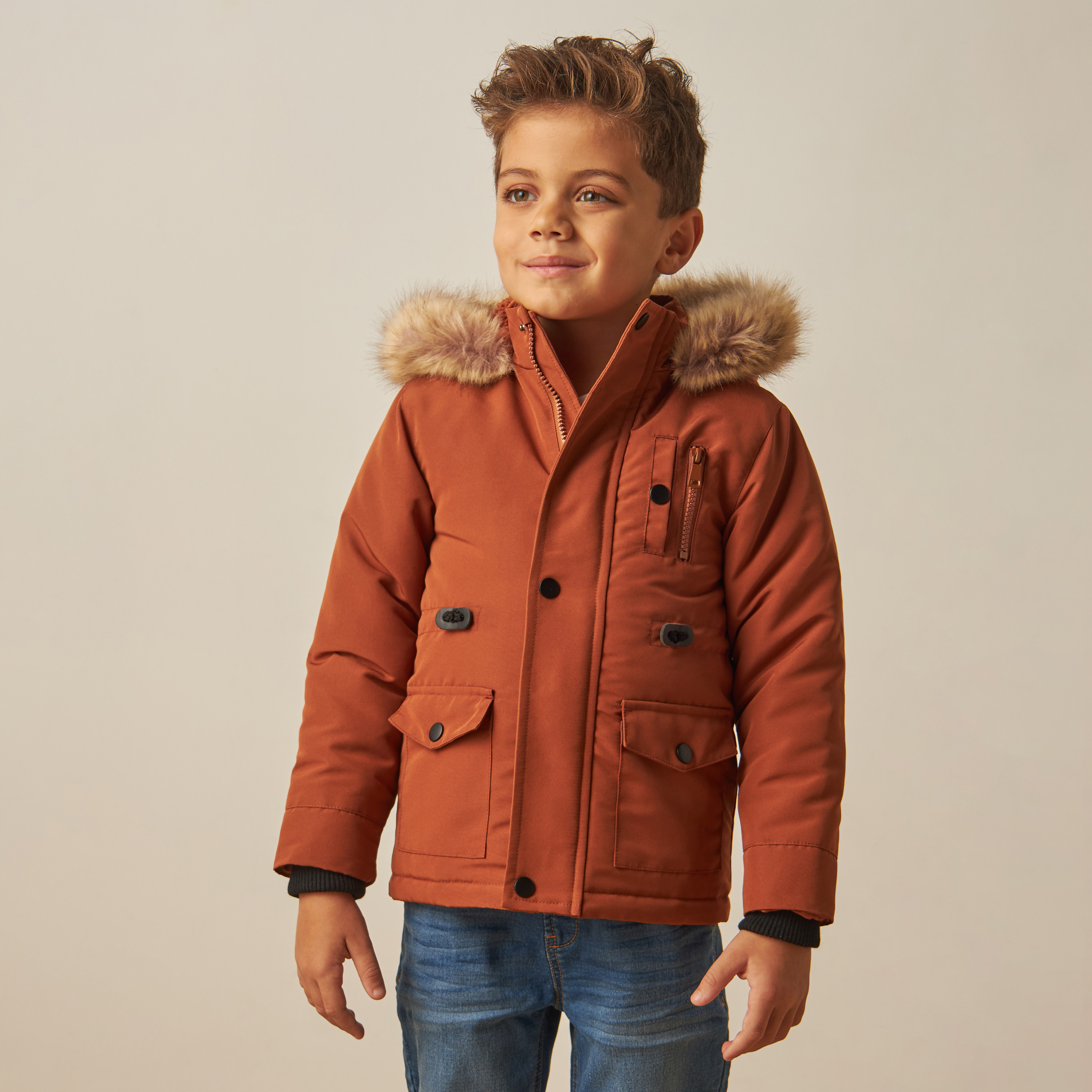 Orange parka shop with fur hood