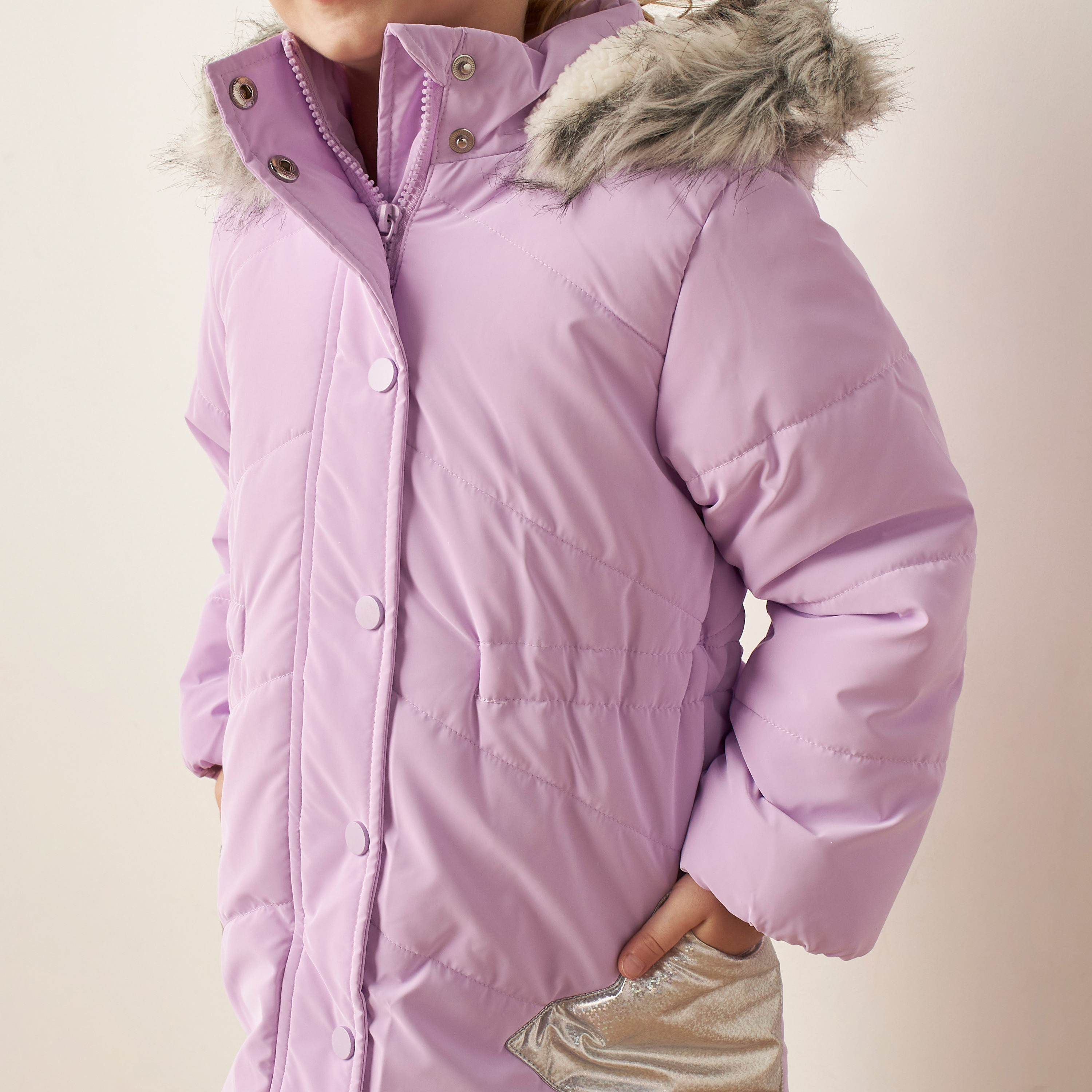 Padded jacket with clearance belt and fur hood