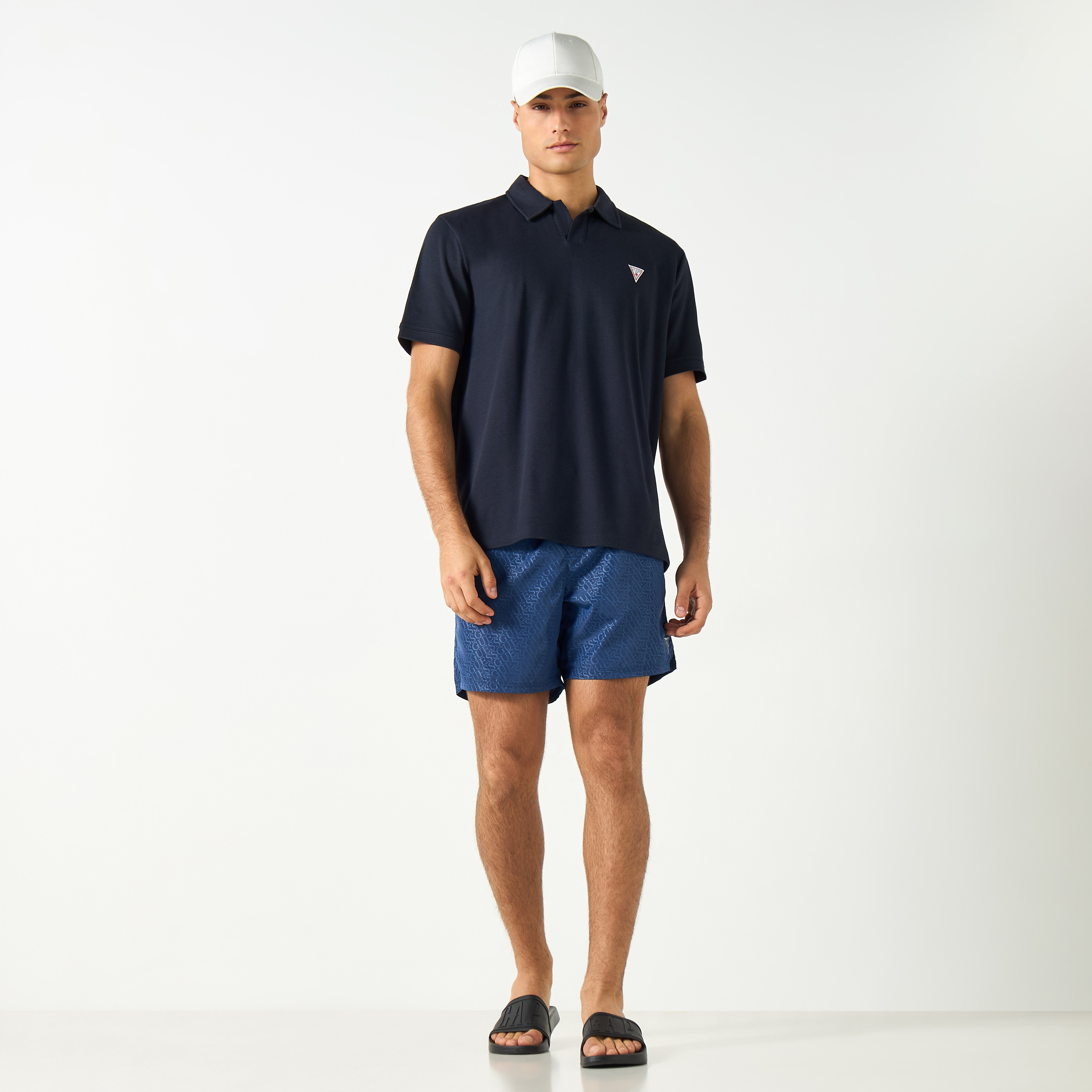 Guess All-Over Logo Print Swim Shorts with Drawstring Closure and Pockets-men-clothing-swimandbeach-shorts-image-2