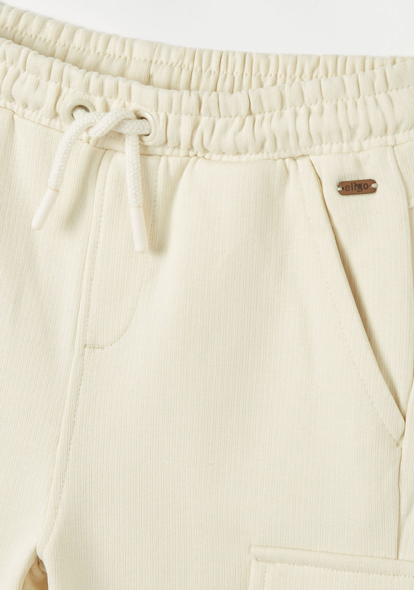 Eligo Solid Shorts with Drawstring Closure and Flap Pockets-Shorts-image-1