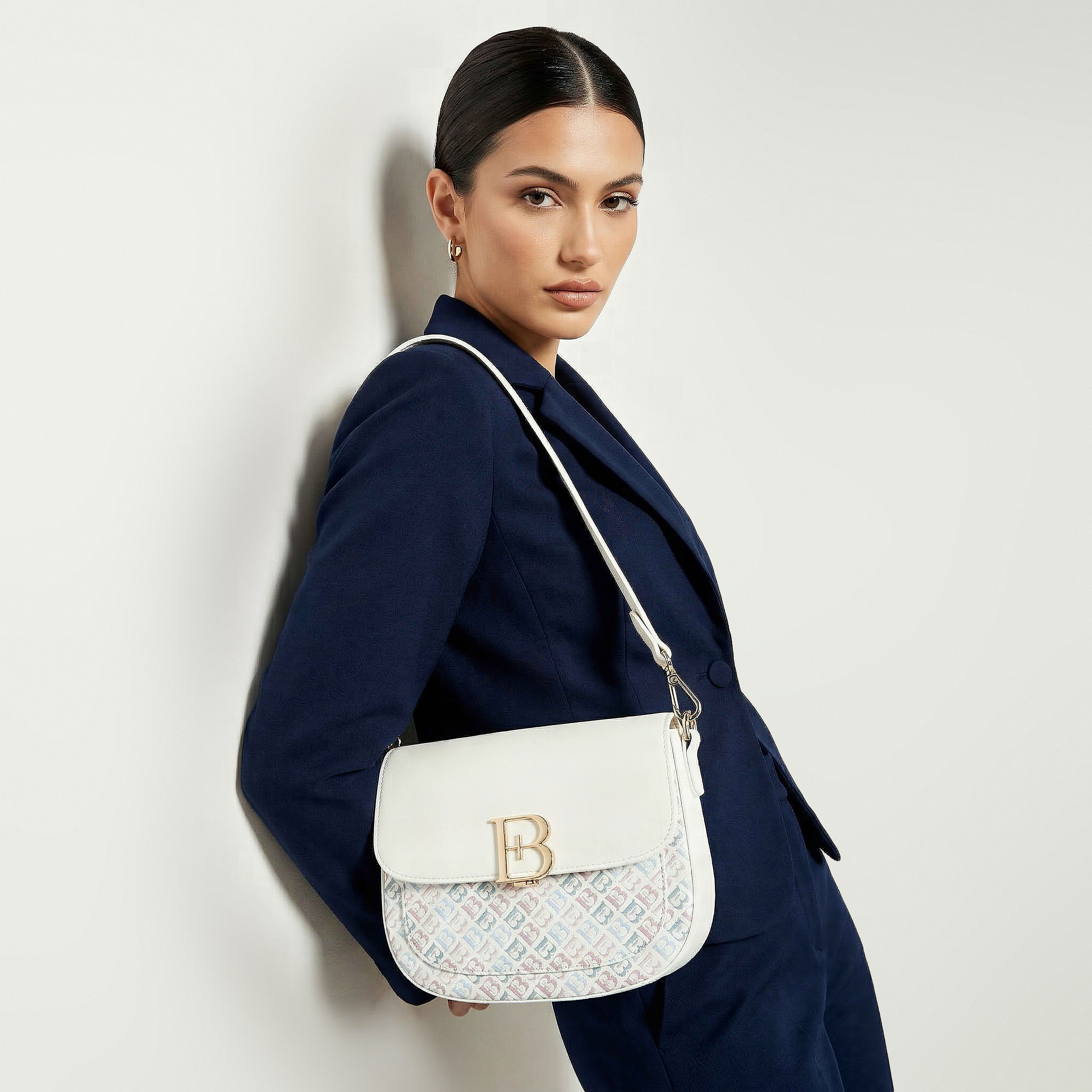 شنطة كتف بطبعات مونوجرام وطية من فلورا بيلا-women-bagsandwallets-handbags-image-1