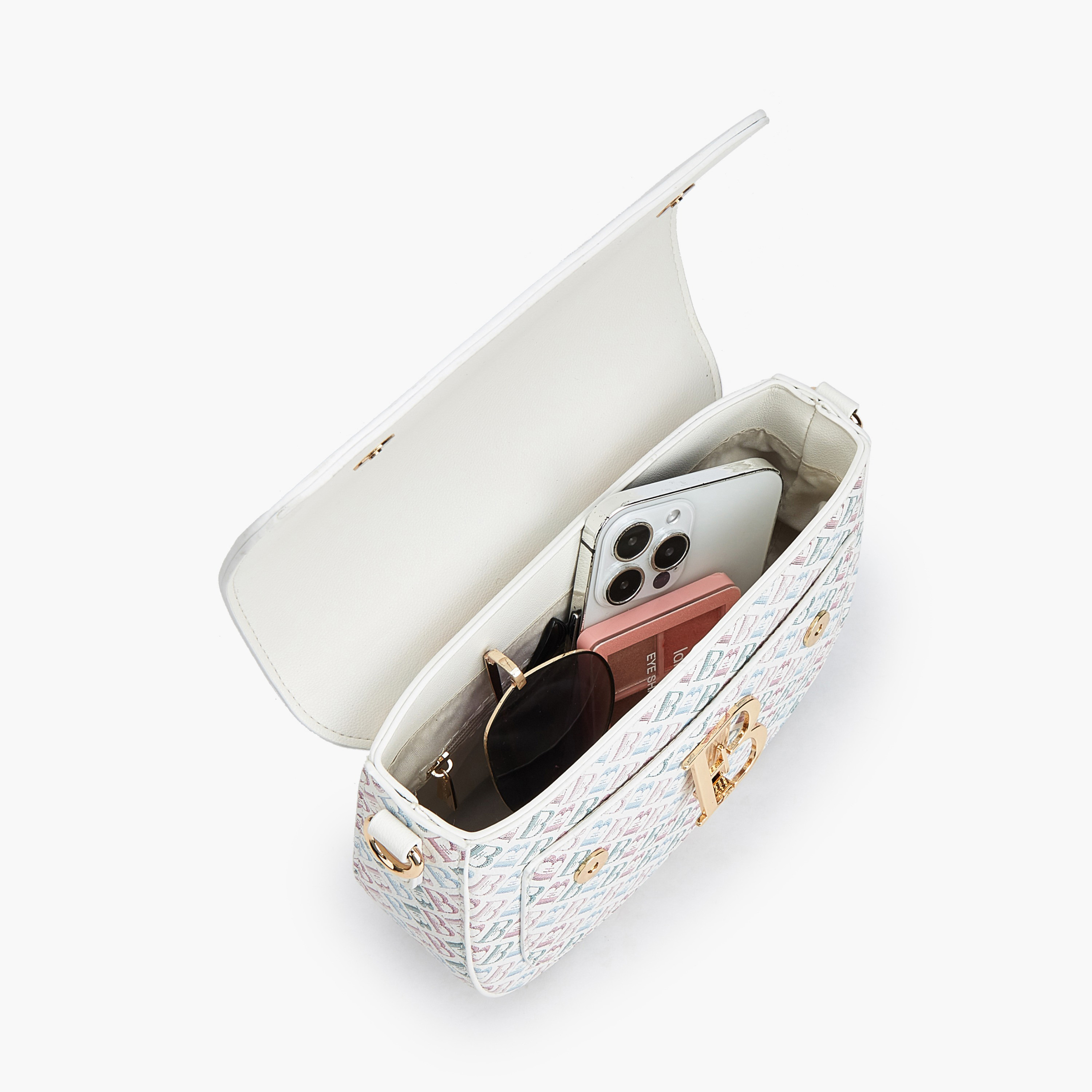 شنطة كتف بطبعات مونوجرام وطية من فلورا بيلا-women-bagsandwallets-handbags-image-9