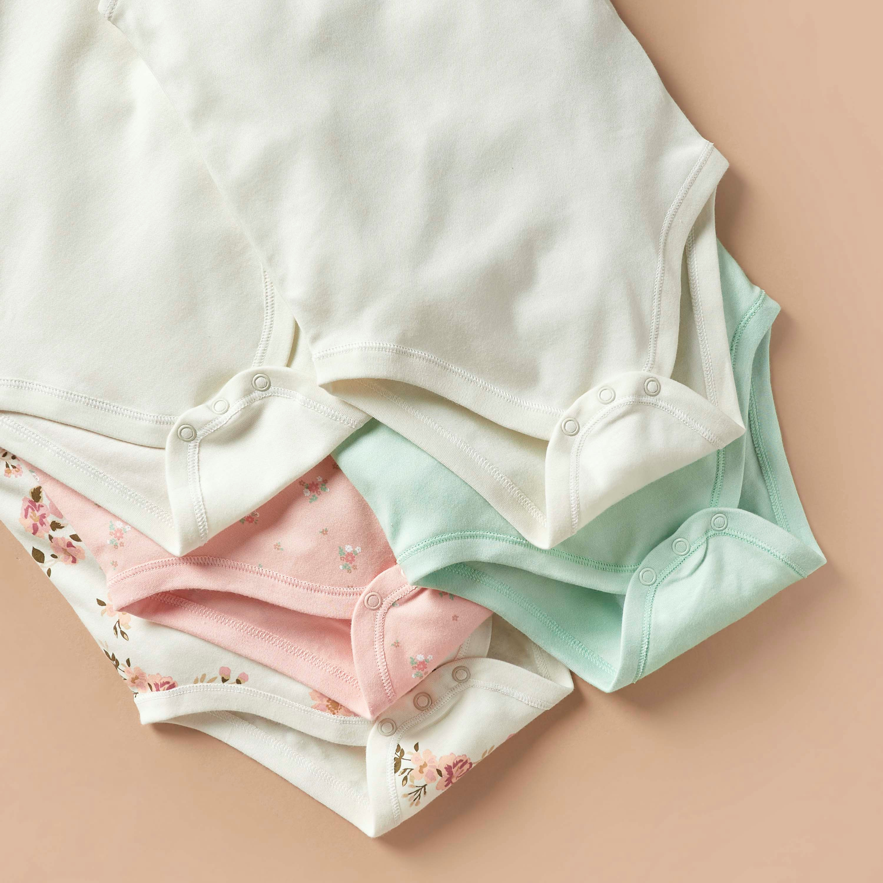 بودي سوت دون أكمام بطبعات من جونيورز - طقم من 7 قطع-baby-girls-clothing-bodysuits-image-4
