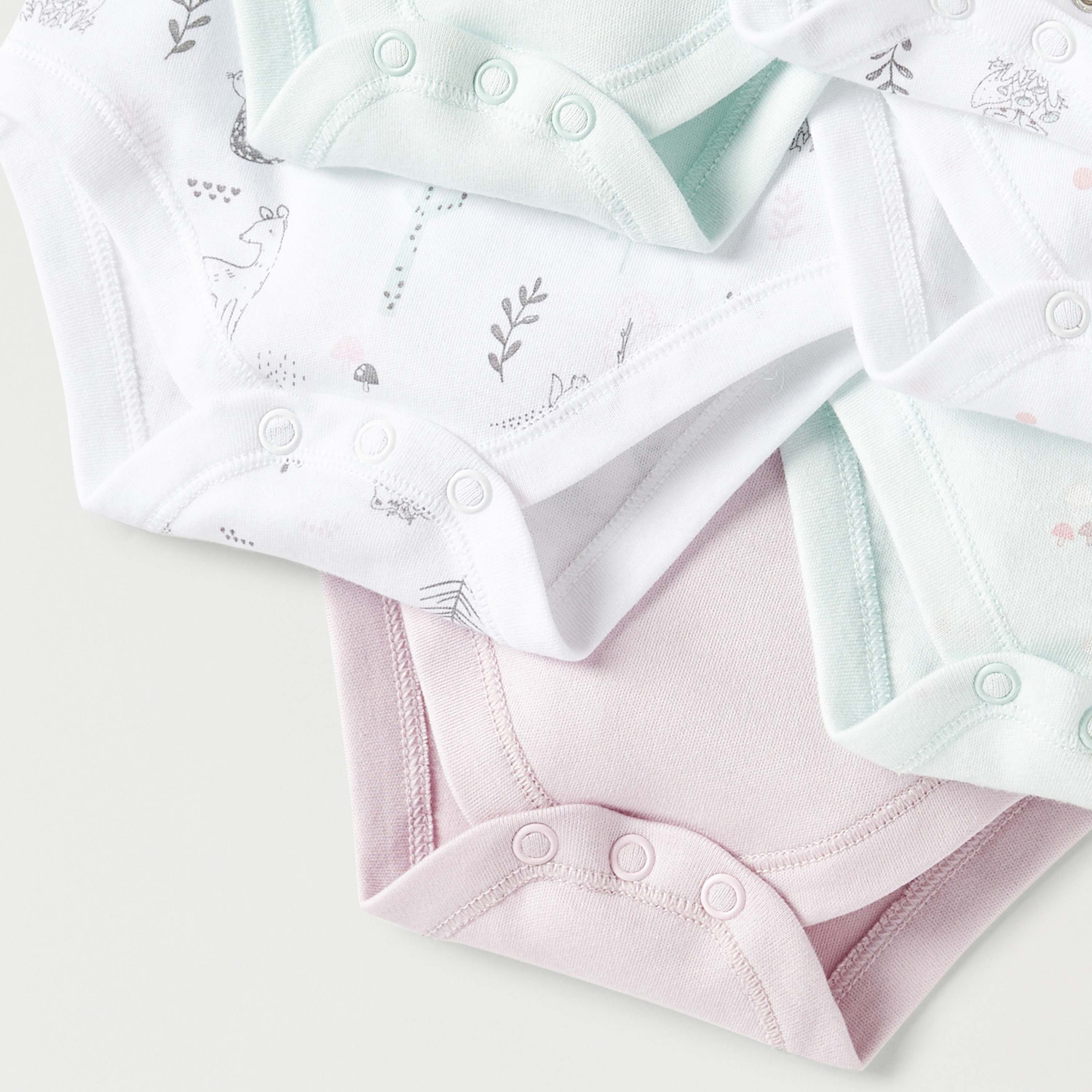بودي سوت دون أكمام بطبعات من جونيورز - طقم من 7 قطع-baby-girls-clothing-bodysuits-image-9