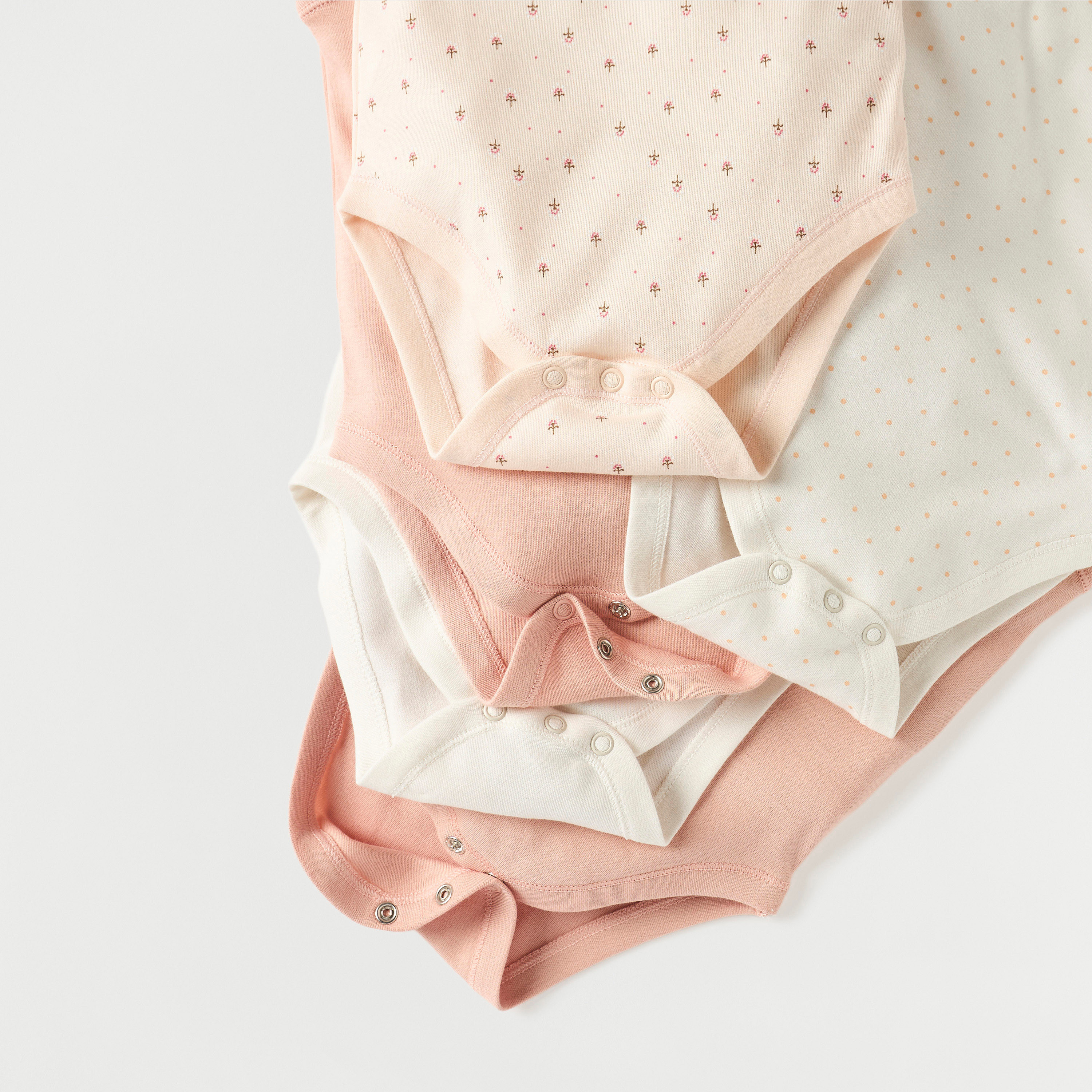بودي سوت دون أكمام بأزرار إغلاق وطبعات من جونيورز - طقم 7 قطع-baby-girls-clothing-bodysuits-image-4