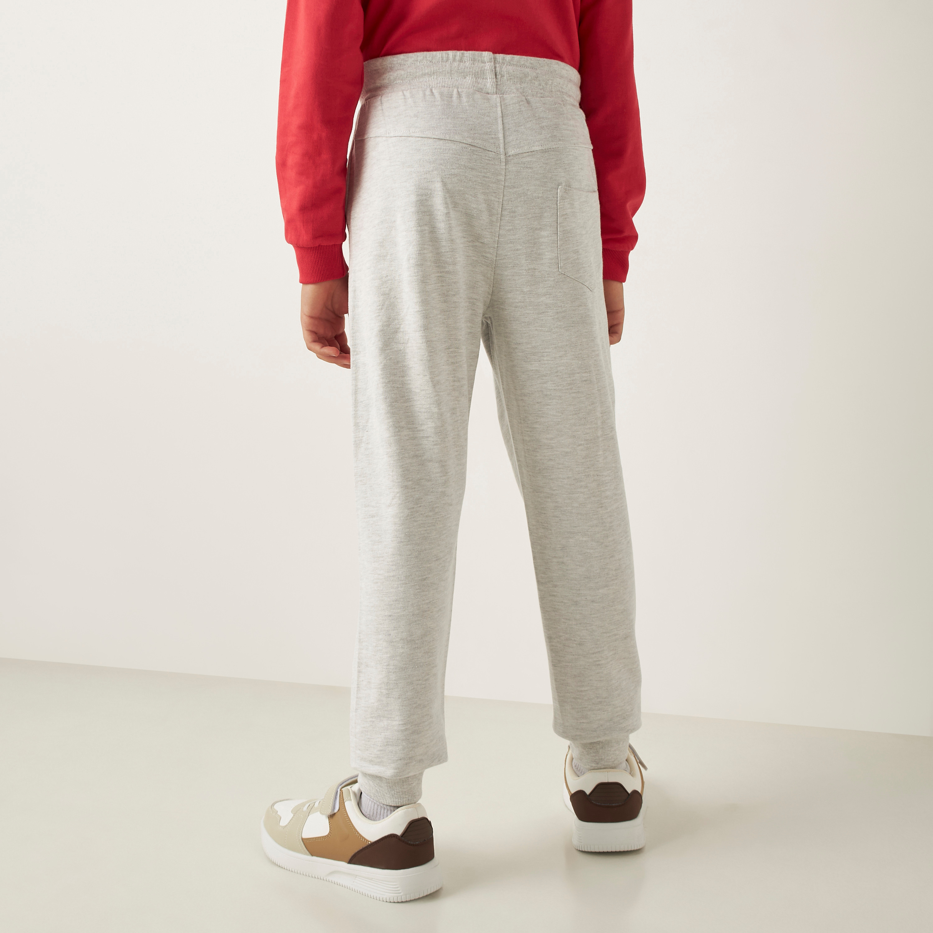 بنطلون رياضي قطن برباط إغلاق وطبعات من جونيورز-boys-clothing-bottoms-joggersandtrackpants-image-4