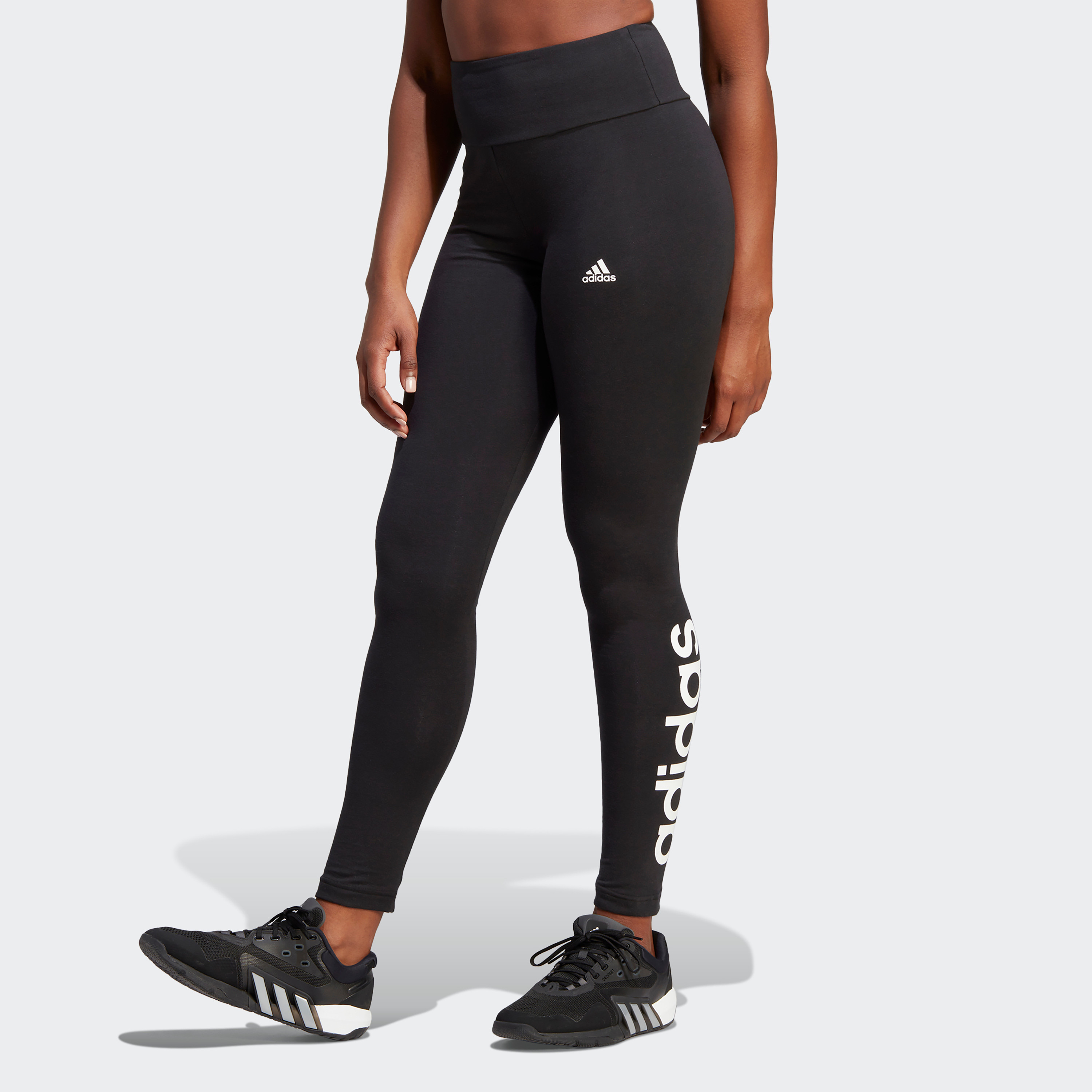 بنطلون ضيق للنساء بشعار اسنشيالز عالي الخصر من اديداس| او اي-women-clothing-bottoms-leggings-image-9