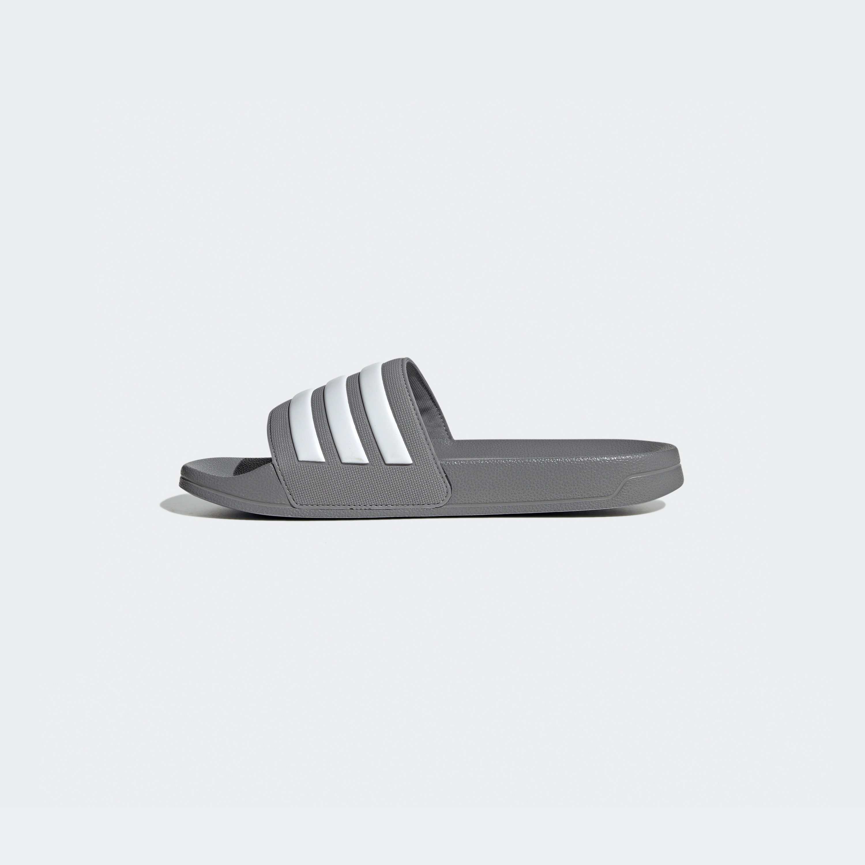 أديداس - شبشب اديليت شاور للرجال GY1891-men-shoes-flipflopsandslides-image-3