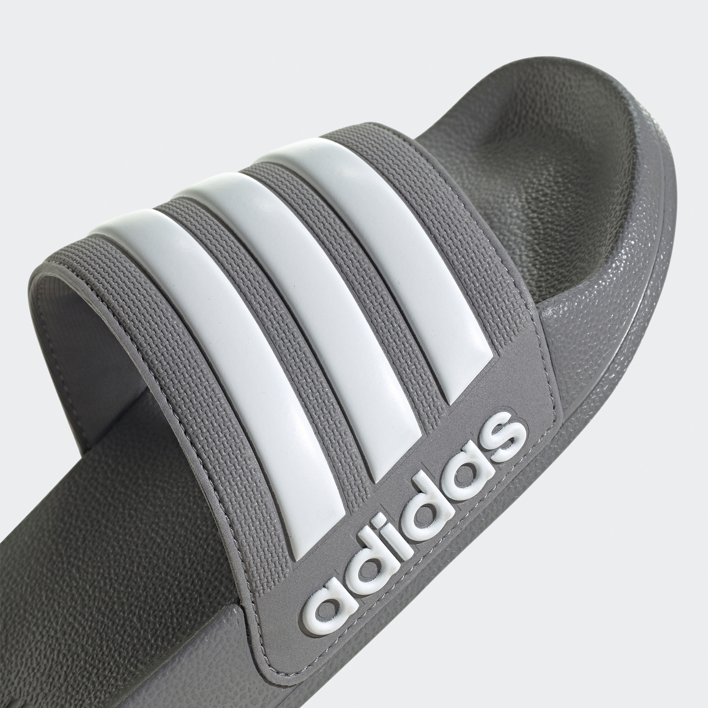 أديداس - شبشب اديليت شاور للرجال GY1891-men-shoes-flipflopsandslides-image-7