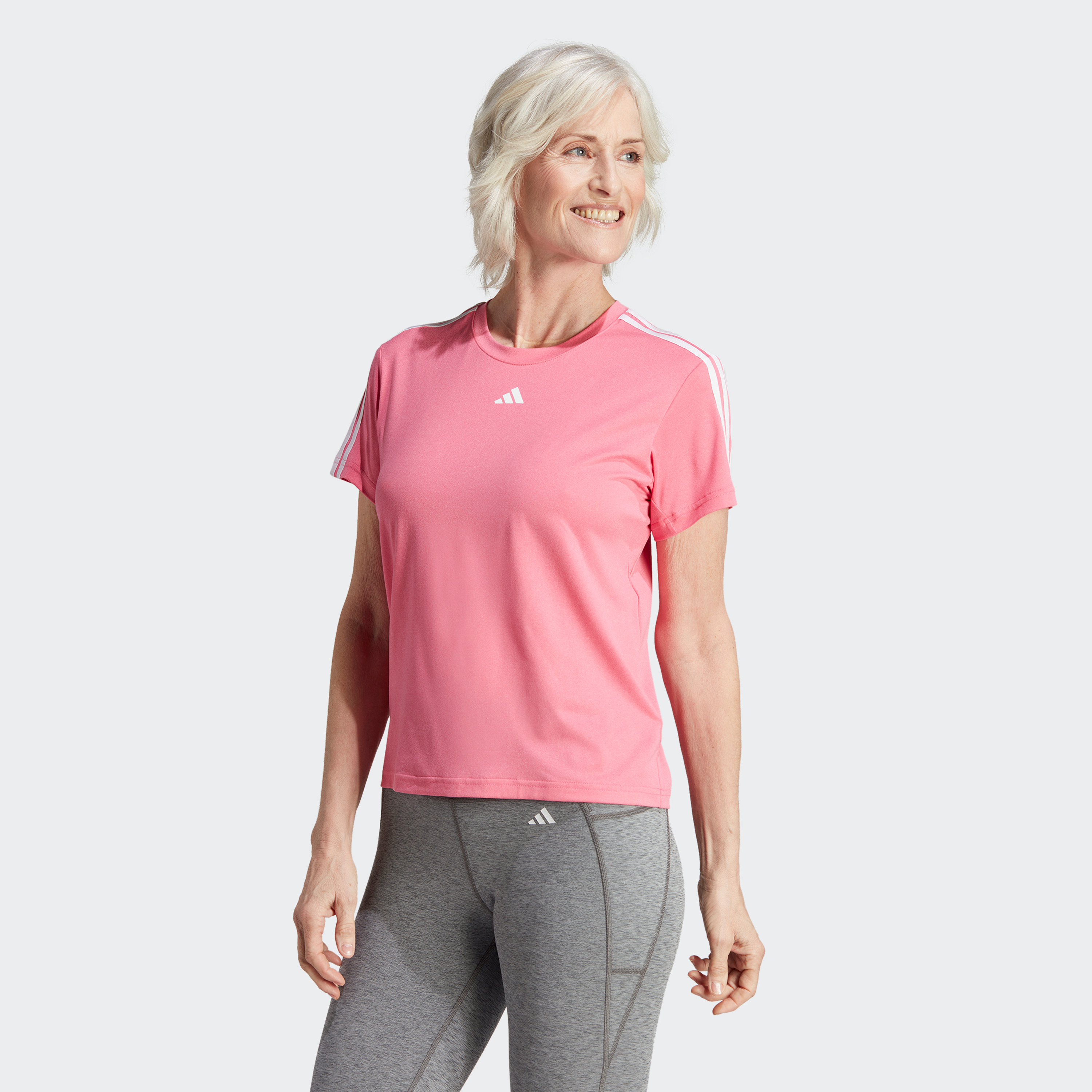 سروال رياضي ايروريدي اسنشيال ترين بثلاثة خطوط من اديداس للنساء | او اي-sports-women-clothing-tshirtsandvests-image-1