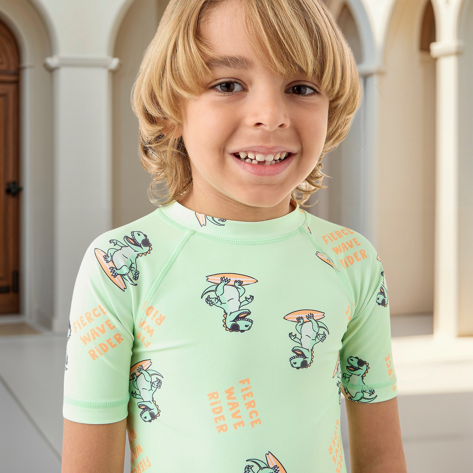 Juniors All-Over Dinosaur Print Swimsuit with Raglan Sleeves-sports-gear-swimming-boy-image-2