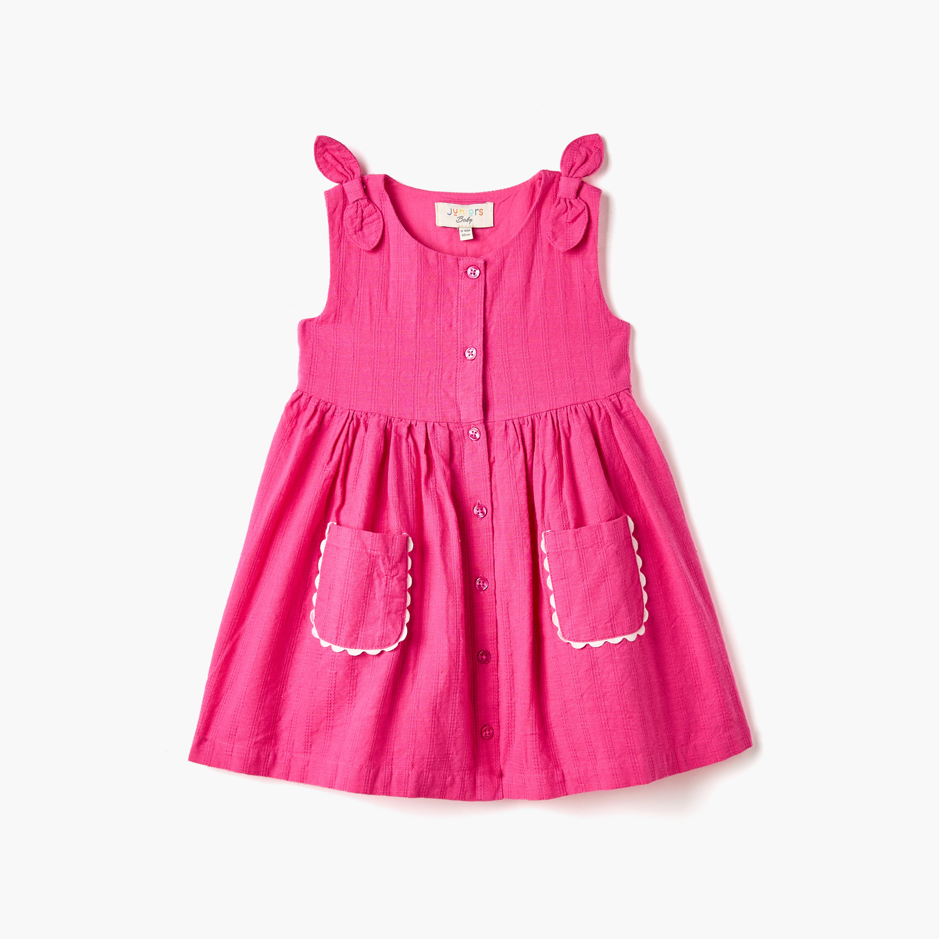 فستان دون أكمام بجيوب وأزرار إغلاق وفيونكة من جونيورز-baby-girls-clothing-dressesandjumpsuits-image-1