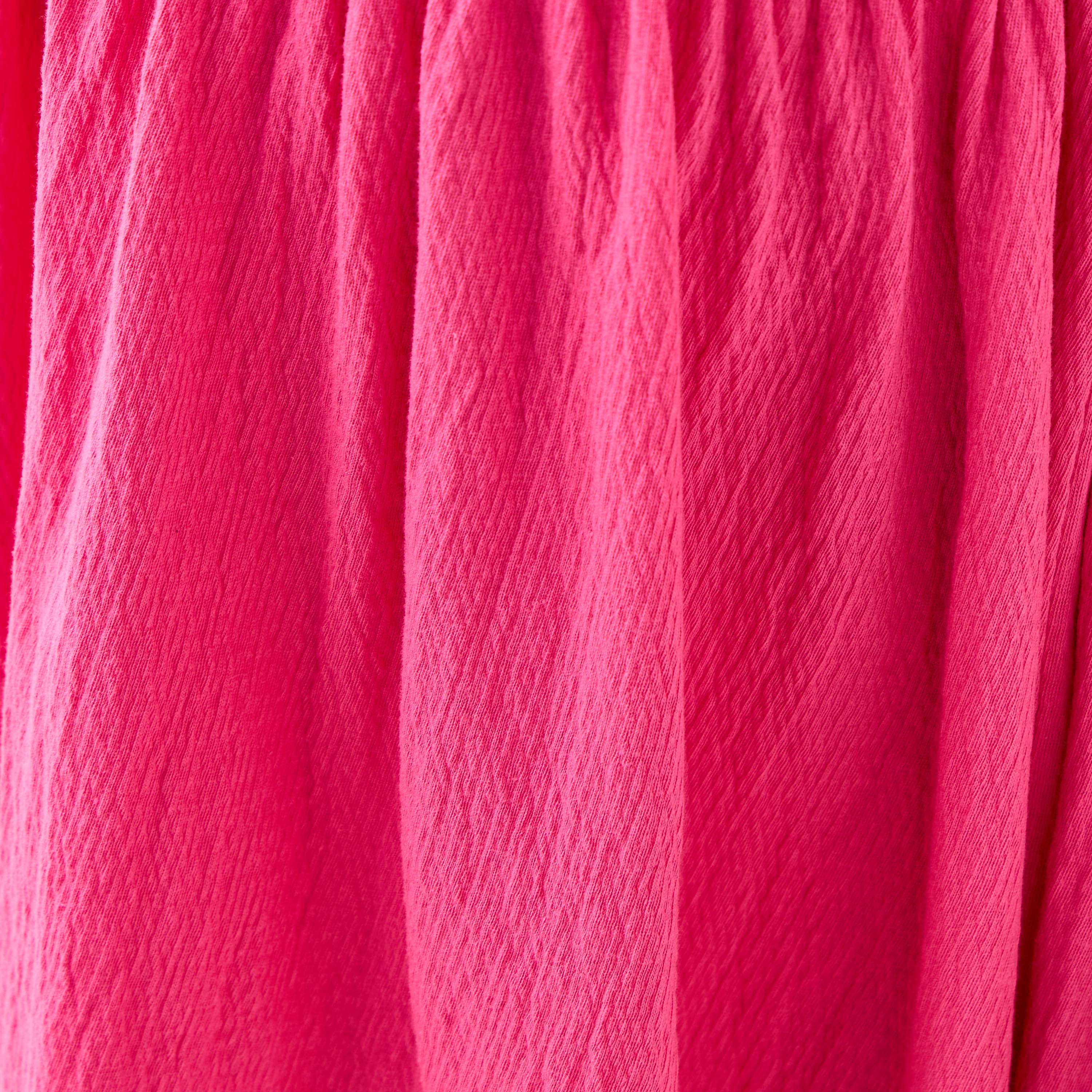 فستان دون أكمام بارز الملمس مع حافة كشكش وفيونكة من جونيورز-girls-clothing-dressesandjumpsuits-image-5