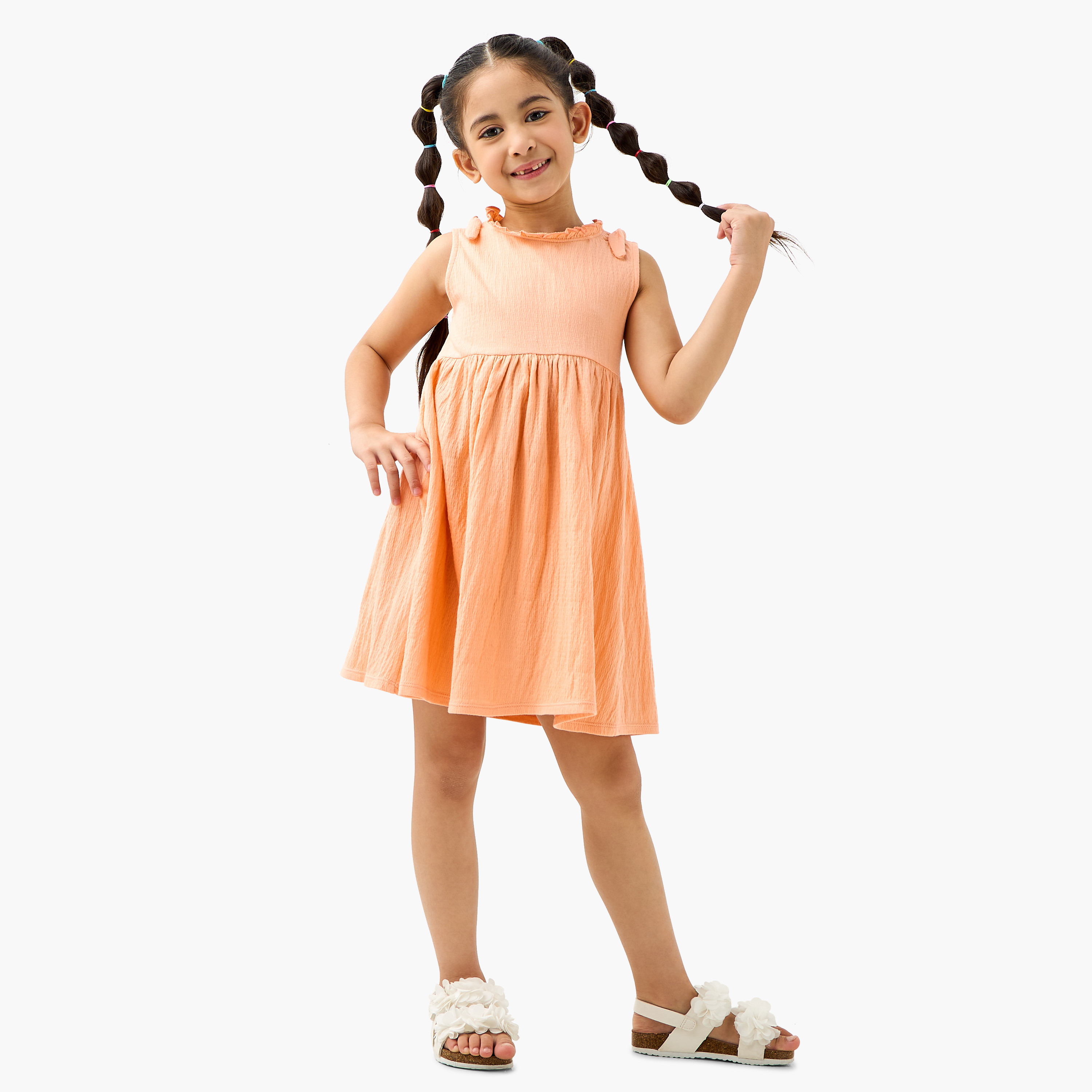 Juniors Textured Sleeveless Dress with Ruffle Trim and Bow Detail-girls-clothing-dressesandjumpsuits-image-1