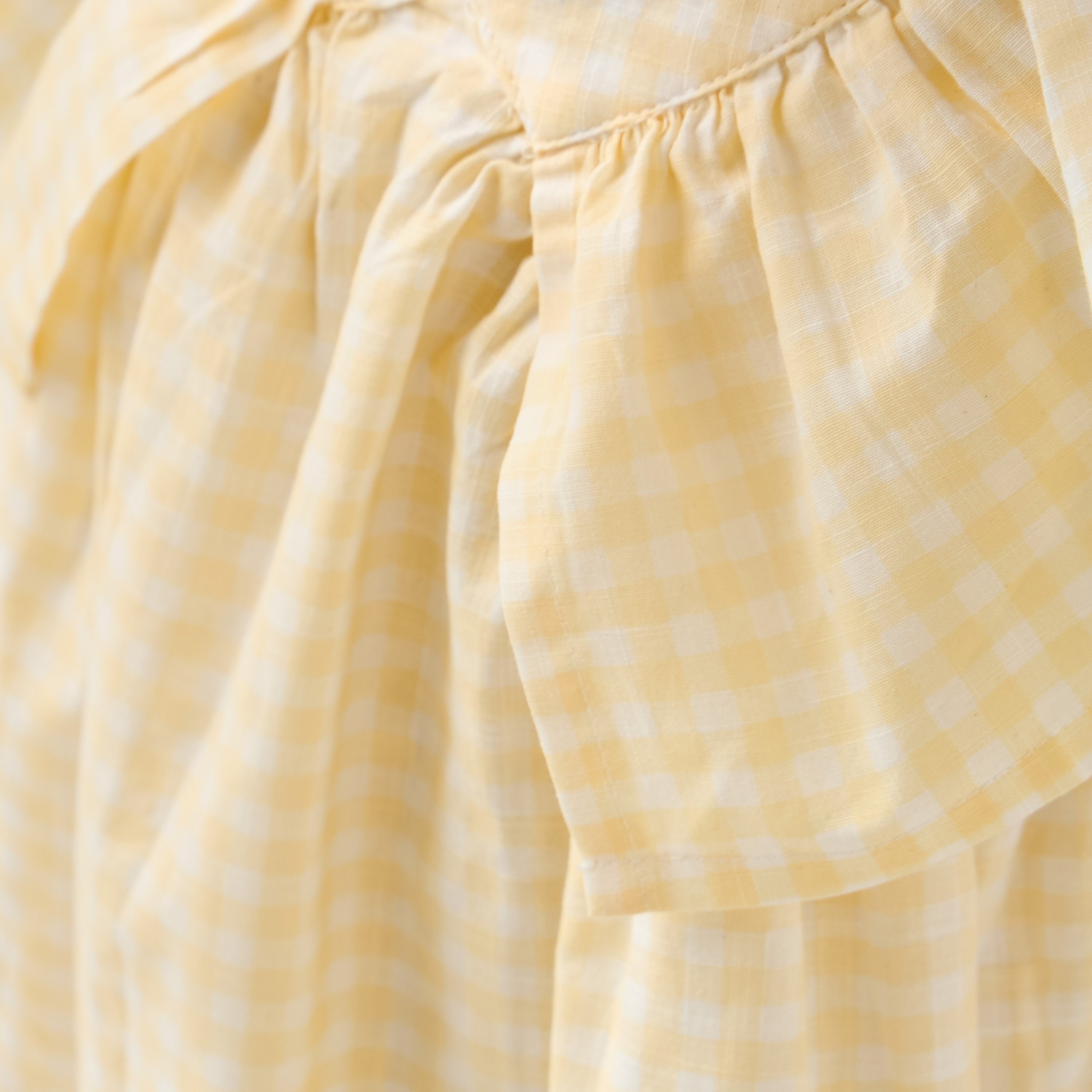 فستان مربعات بتفاصيل كشكش من جونيورز-girls-clothing-dressesandjumpsuits-image-5