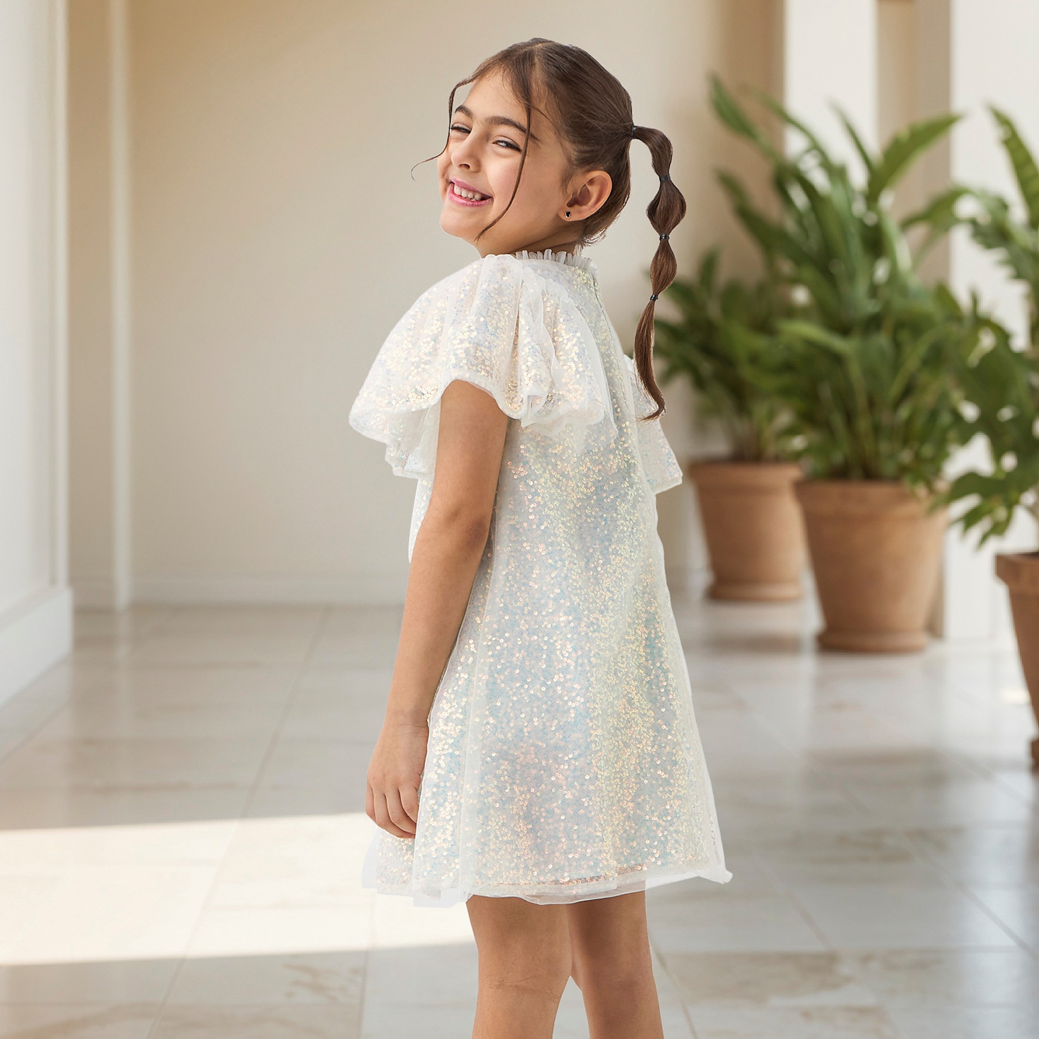 فستان مزين بأكمام كاب بتفاصيل كشكش من جونيورز-girls-clothing-dressesandjumpsuits-image-3