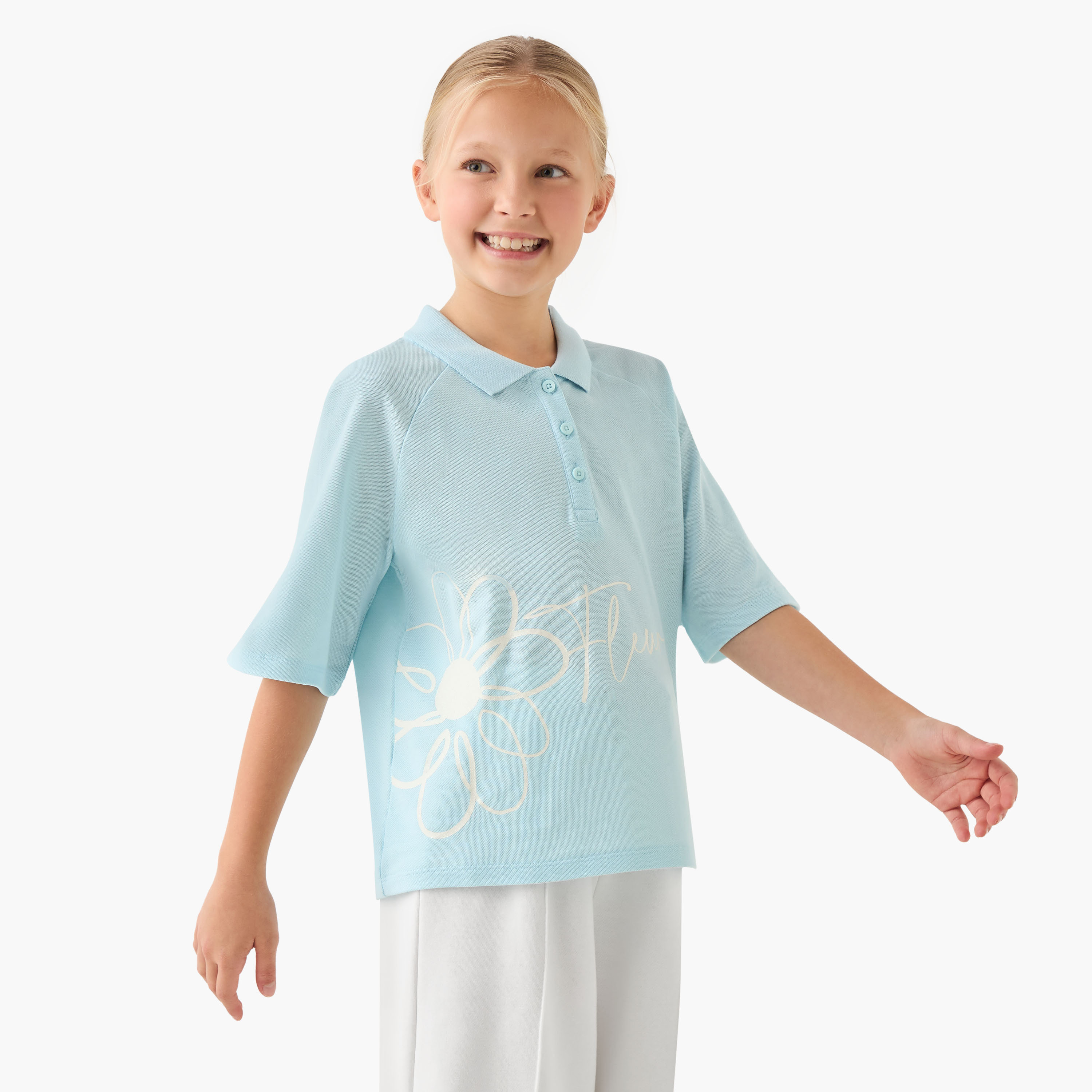 تيشيرت بياقة بولو ووصلة نصف أزرار وأكمام قصيرة وطبعات زهرية-girls-clothing-tshirts-image-1