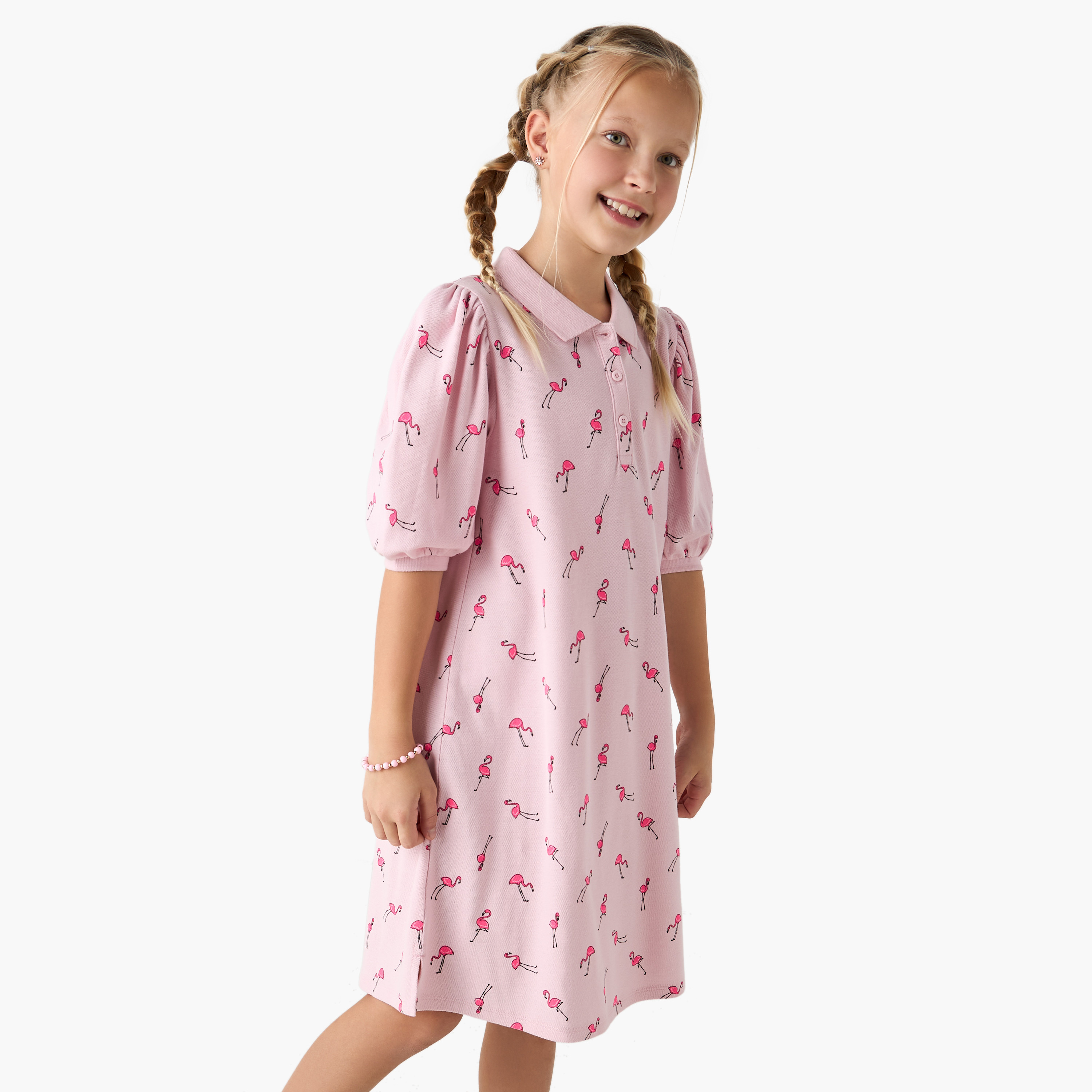فستان بولو بأكمام قصيرة وطبعات فلامنجو من جونيورز-girls-clothing-dressesandjumpsuits-image-1