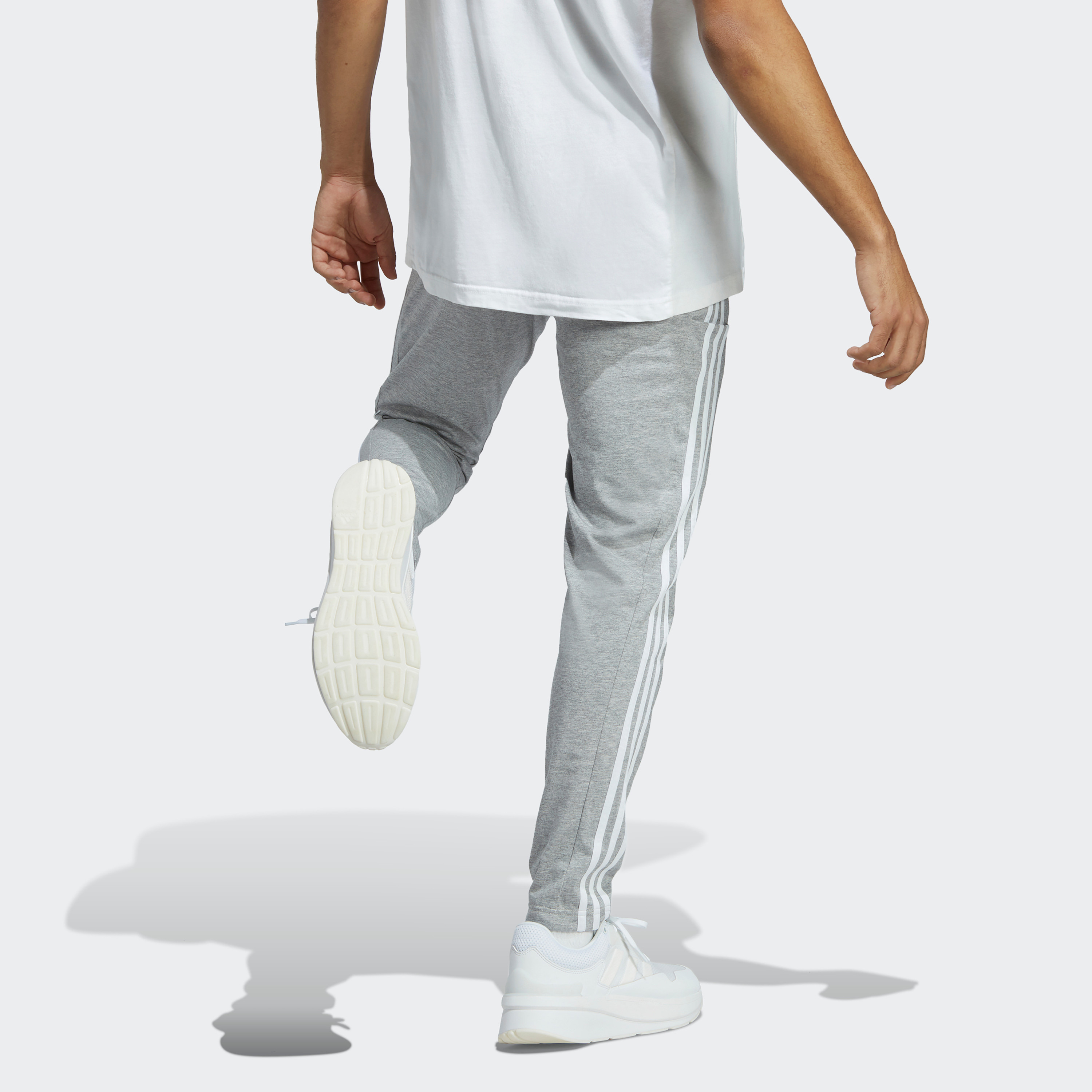 سروال اسنشالز للرجال بحاشية مفتوحة وتصميم خطوط اديداس الثلاثة| او اي-men-clothing-sportswearandactivewear-bottoms-image-12
