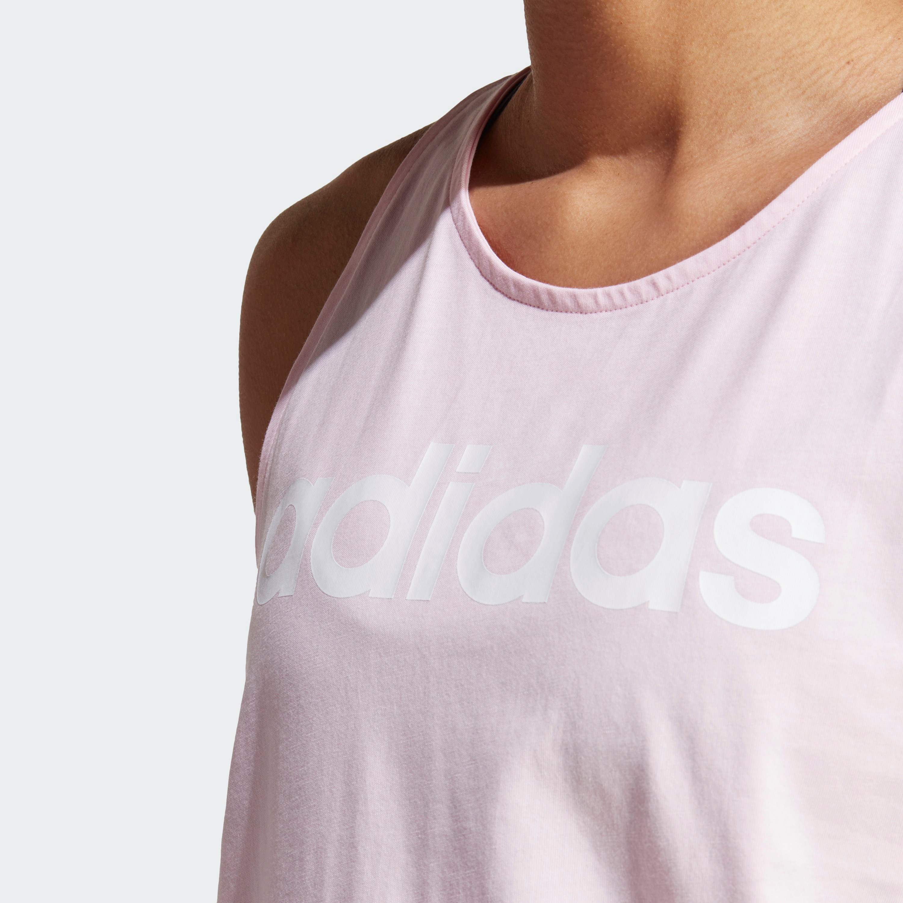 تانك توب بشعار اسنشيالز فضفاض من اديداس| او اي-sports-women-clothing-tshirtsandvests-image-3
