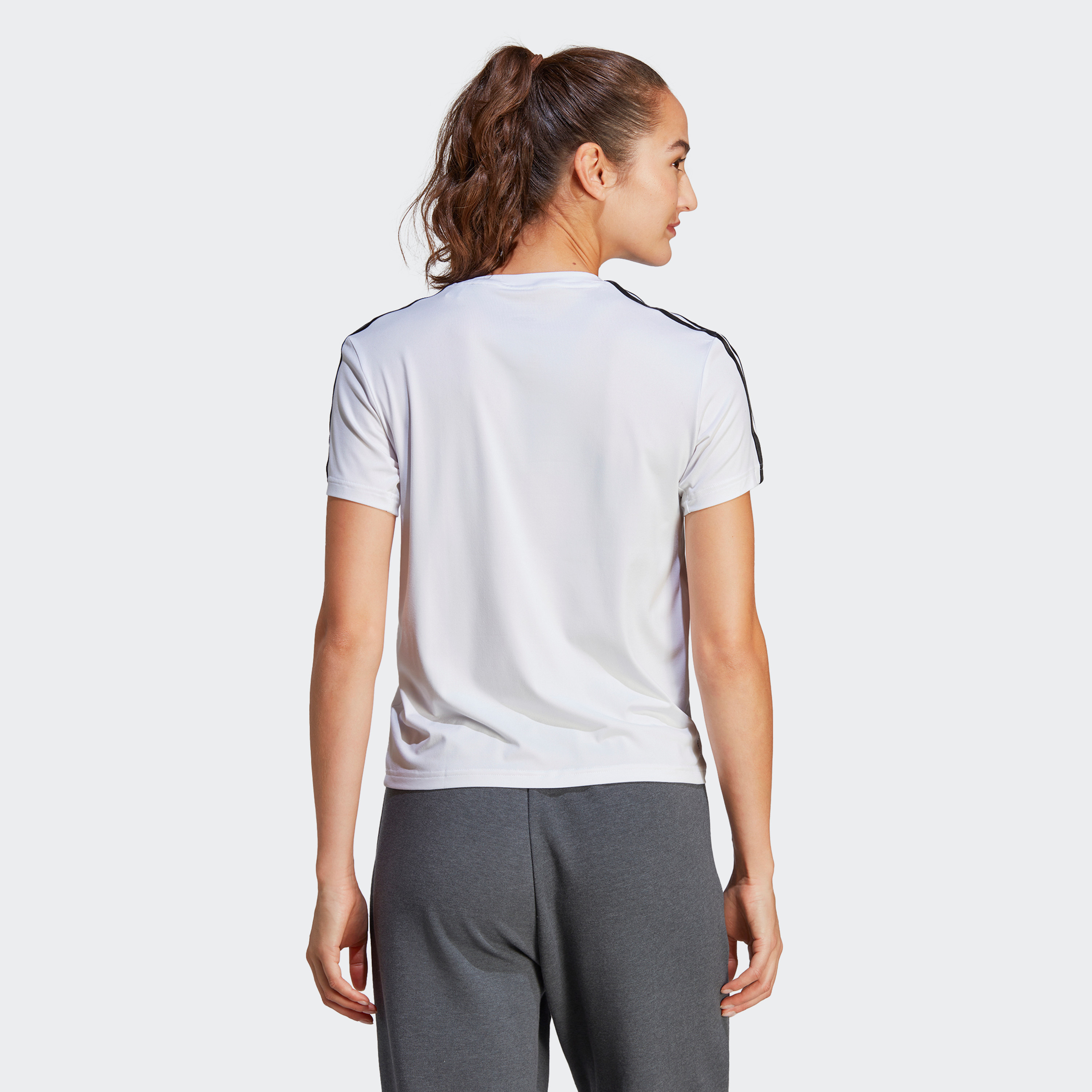 سروال رياضي ايروريدي اسنشيال ترين بثلاثة خطوط من اديداس للنساء | او اي-sports-women-clothing-tshirtsandvests-image-12