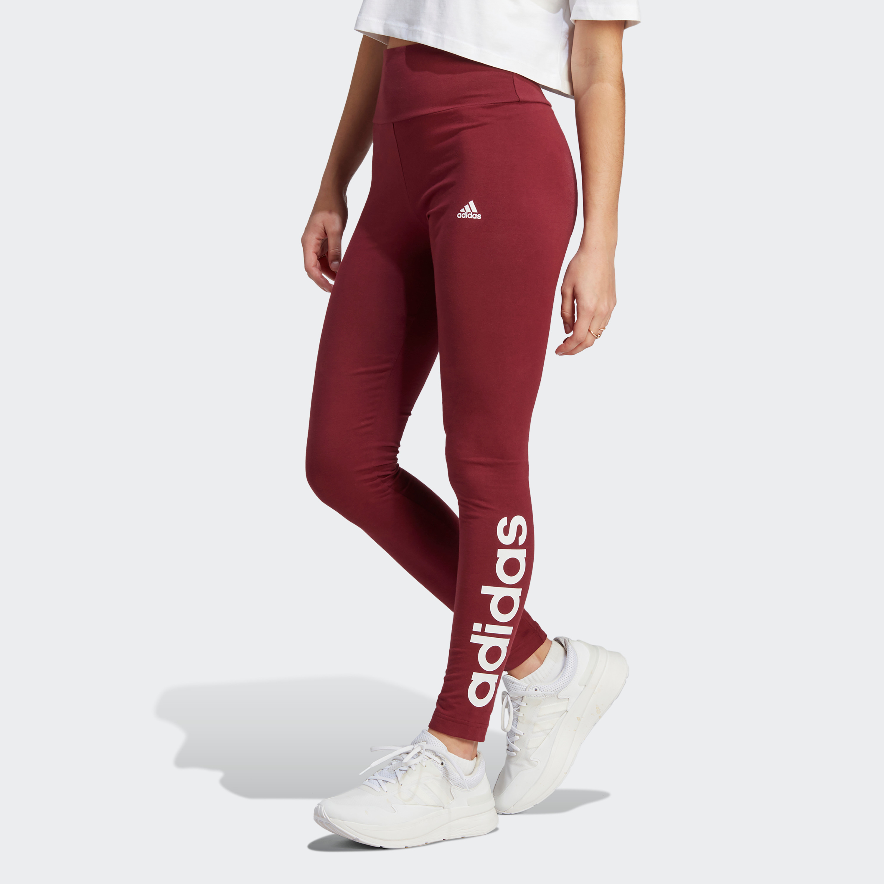 بنطلون ضيق للنساء بشعار اسنشيالز عالي الخصر من اديداس| او اي-women-clothing-bottoms-leggings-image-2