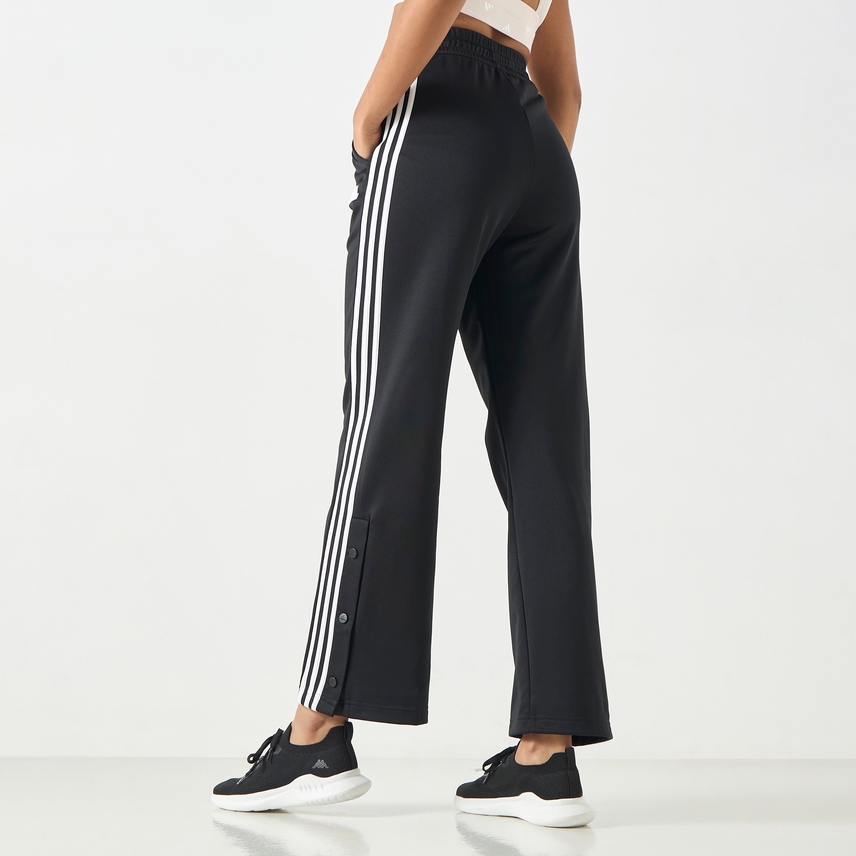 أديداس - بنطال آيكونيك بثلاثة خطوط وكباسات IN1833-women-clothing-bottoms-joggers-image-3