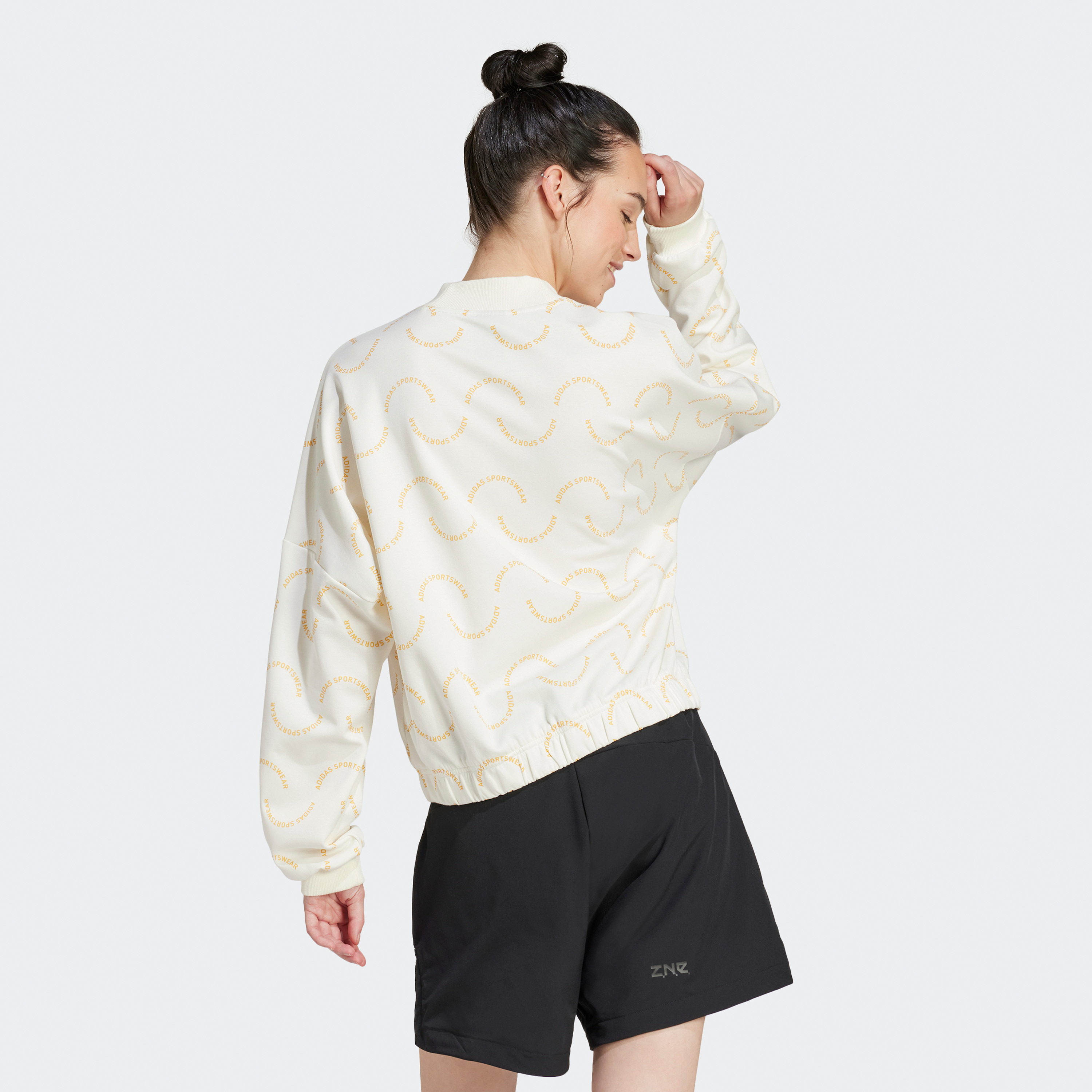 أديداس - سويت شيرت جرافيكي فضفاض ريسورت IN7334-women-clothing-hoodiesandsweatshirts-sweatshirts-image-2