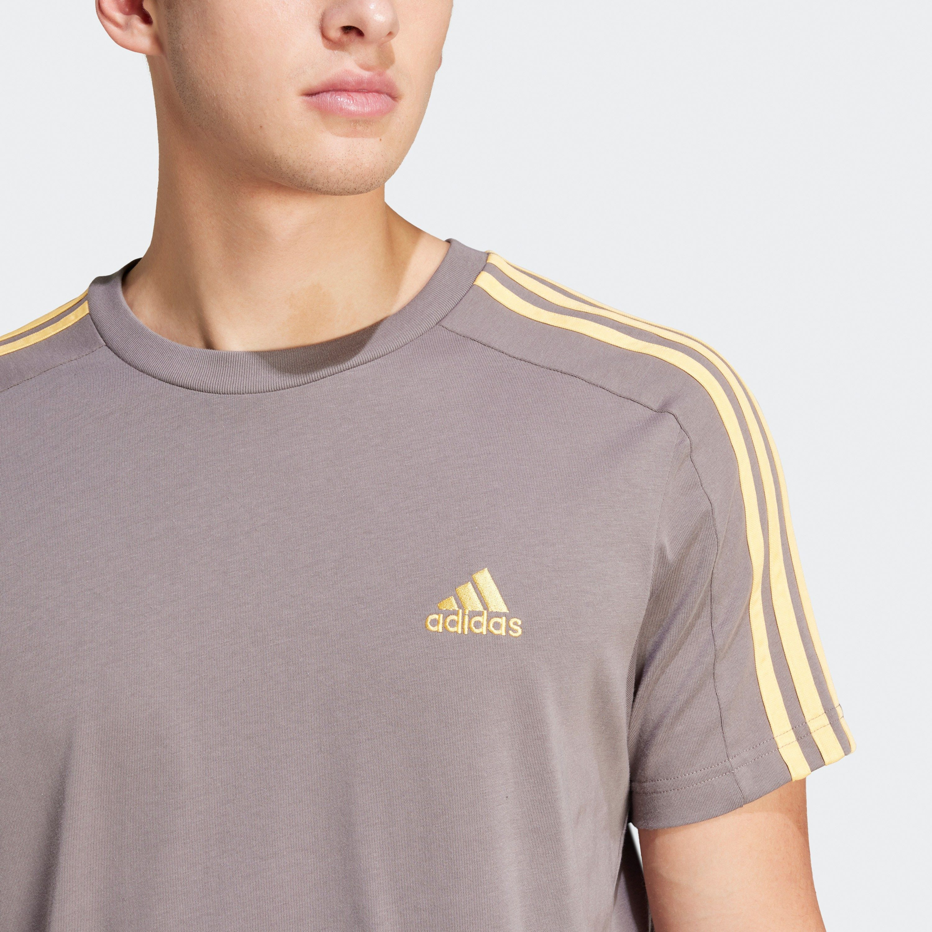 أديداس - تي شيرت جيرسي ايسنشالز 3 خطوط IC9334-men-clothing-sportswearandactivewear-tshirtsandpolos-image-40