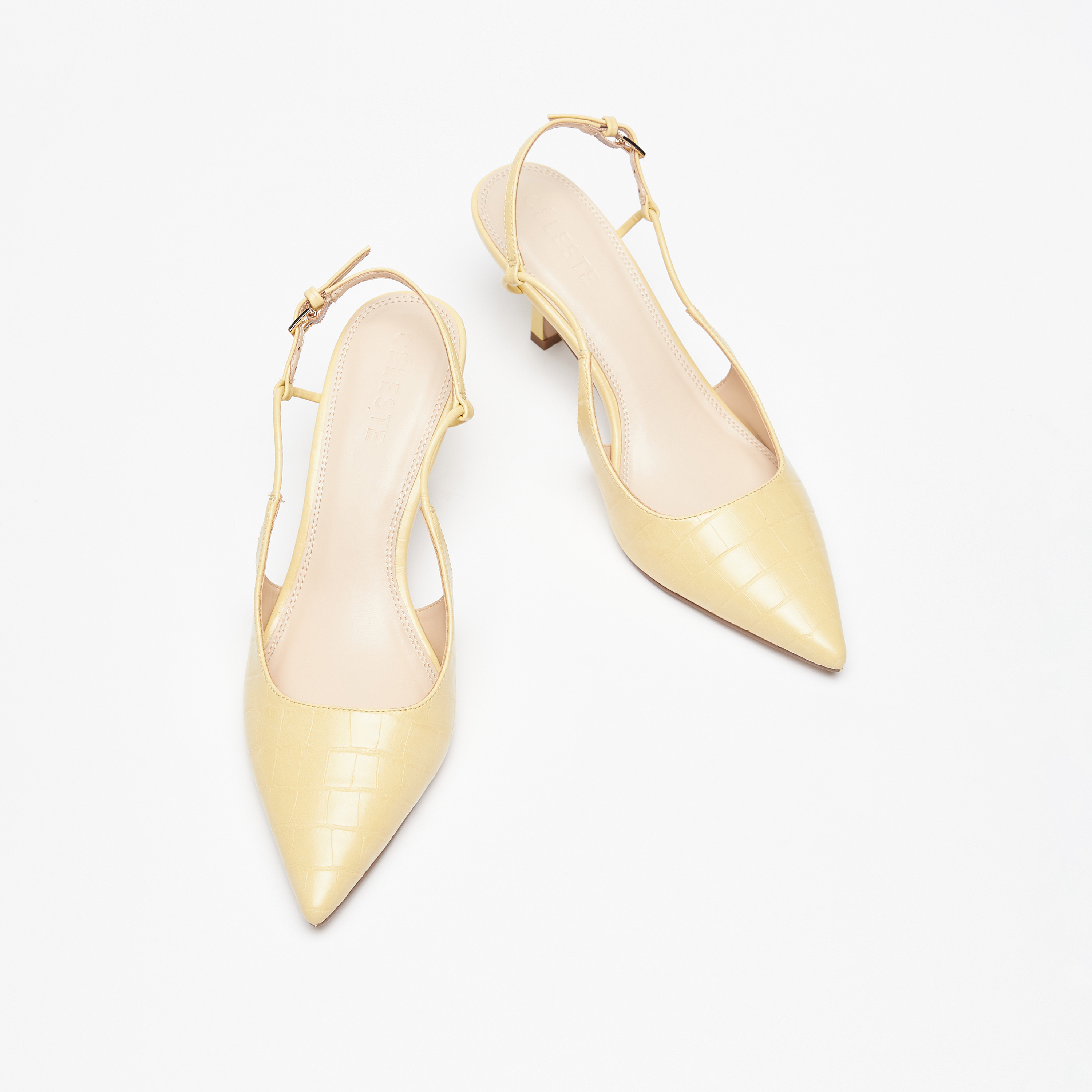 Pale clearance yellow pumps