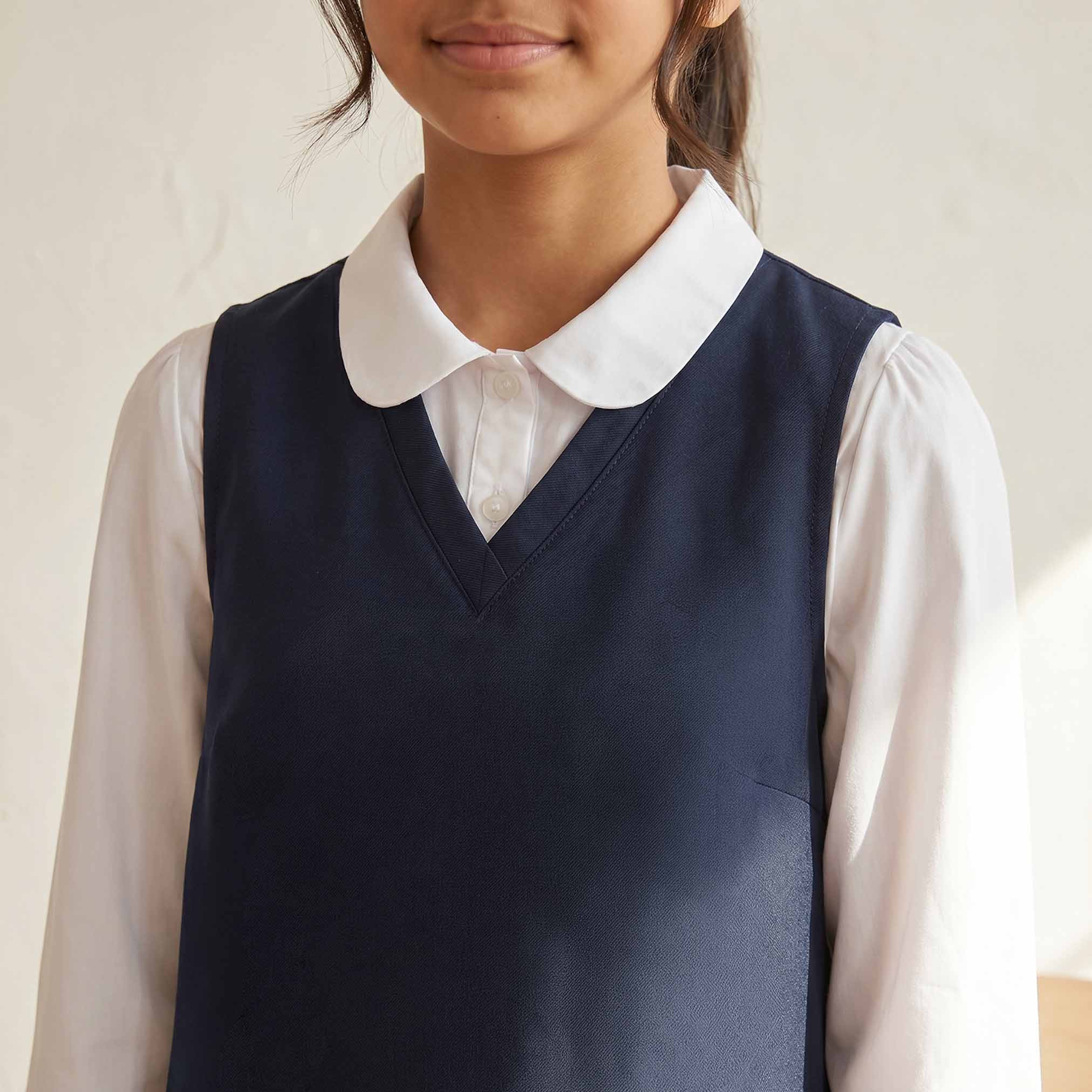 مريلة مدرسية زرقاء داكنة بياقة V من جونيورز - للبنات-girls-clothing-schoolwear-dresses-image-6