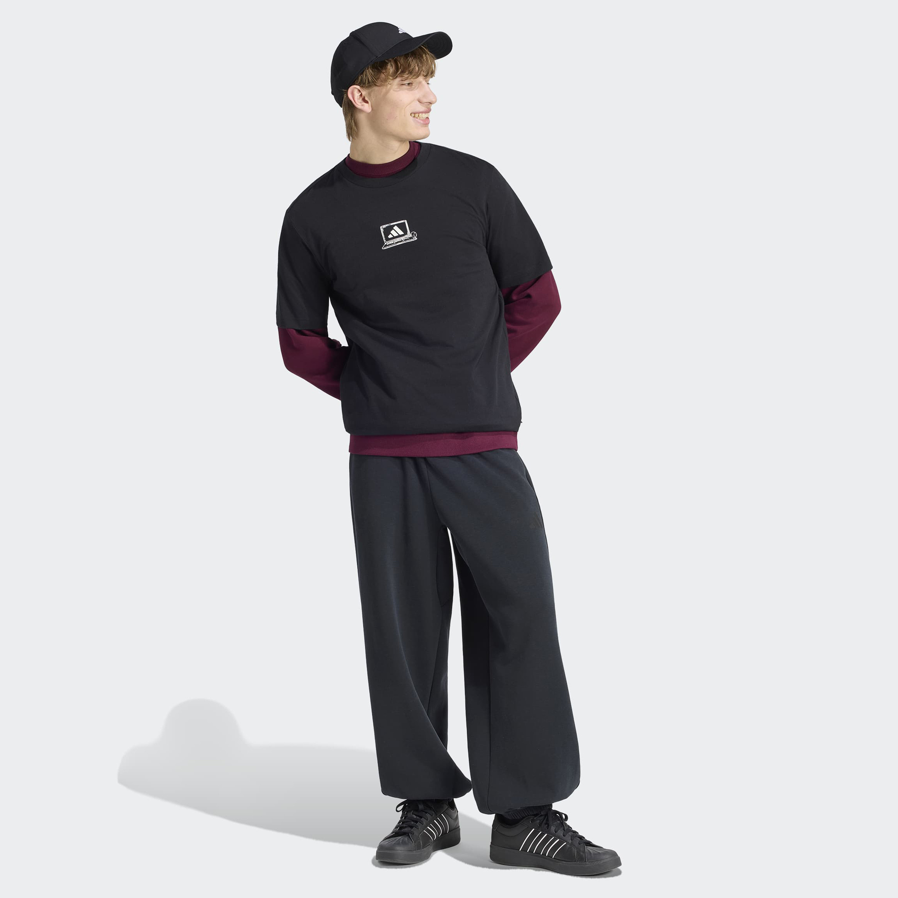 اديداس - تيشيرت رجالي بأكمام قصيرة ورقبة دائرية مطبوع عليه عبارة Clocked In-men-clothing-sportswearandactivewear-tshirtsandpolos-image-2