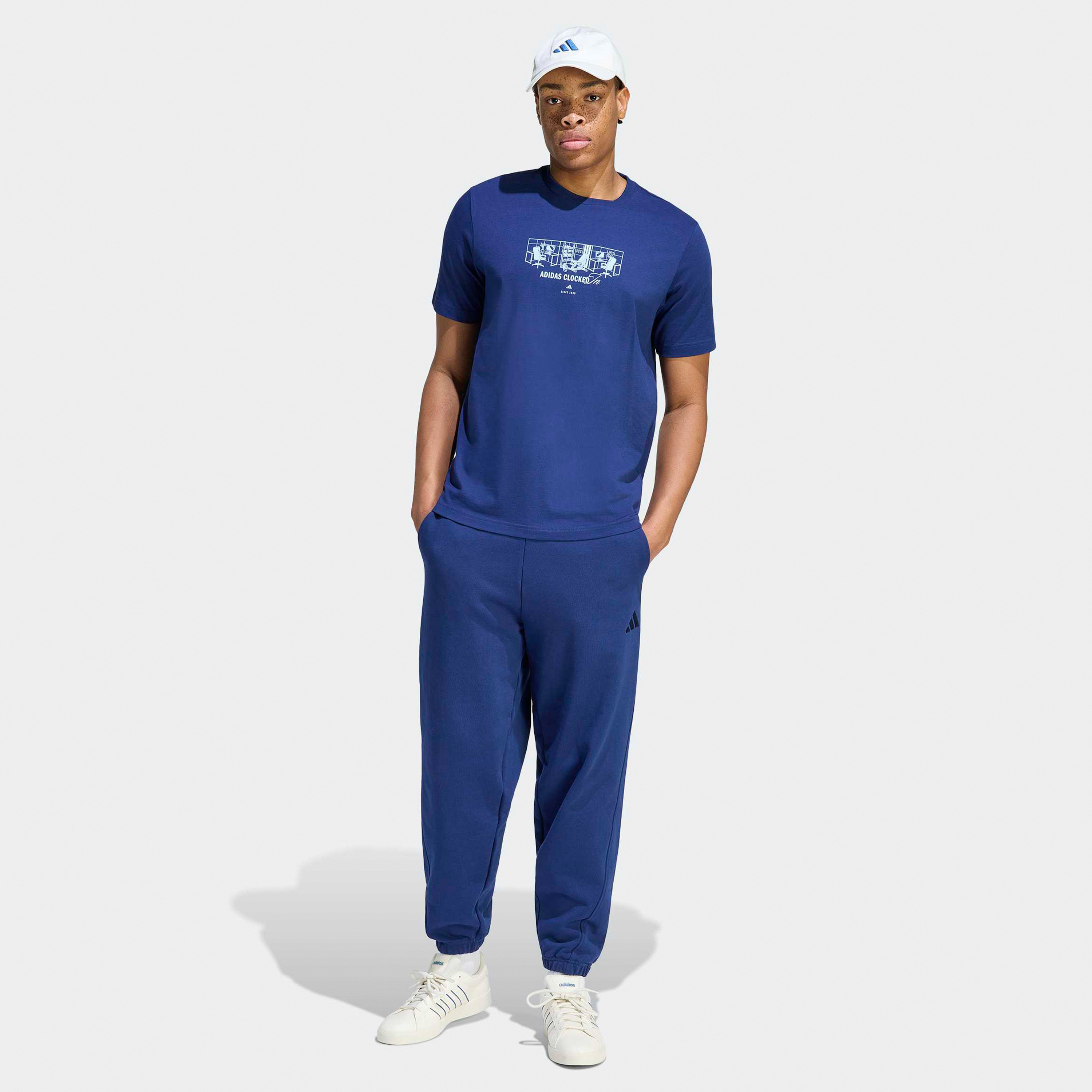 اديداس - تيشيرت رجالي بأكمام قصيرة ورقبة دائرية مطبوع عليه عبارة Clocked In-men-clothing-sportswearandactivewear-tshirtsandpolos-image-2