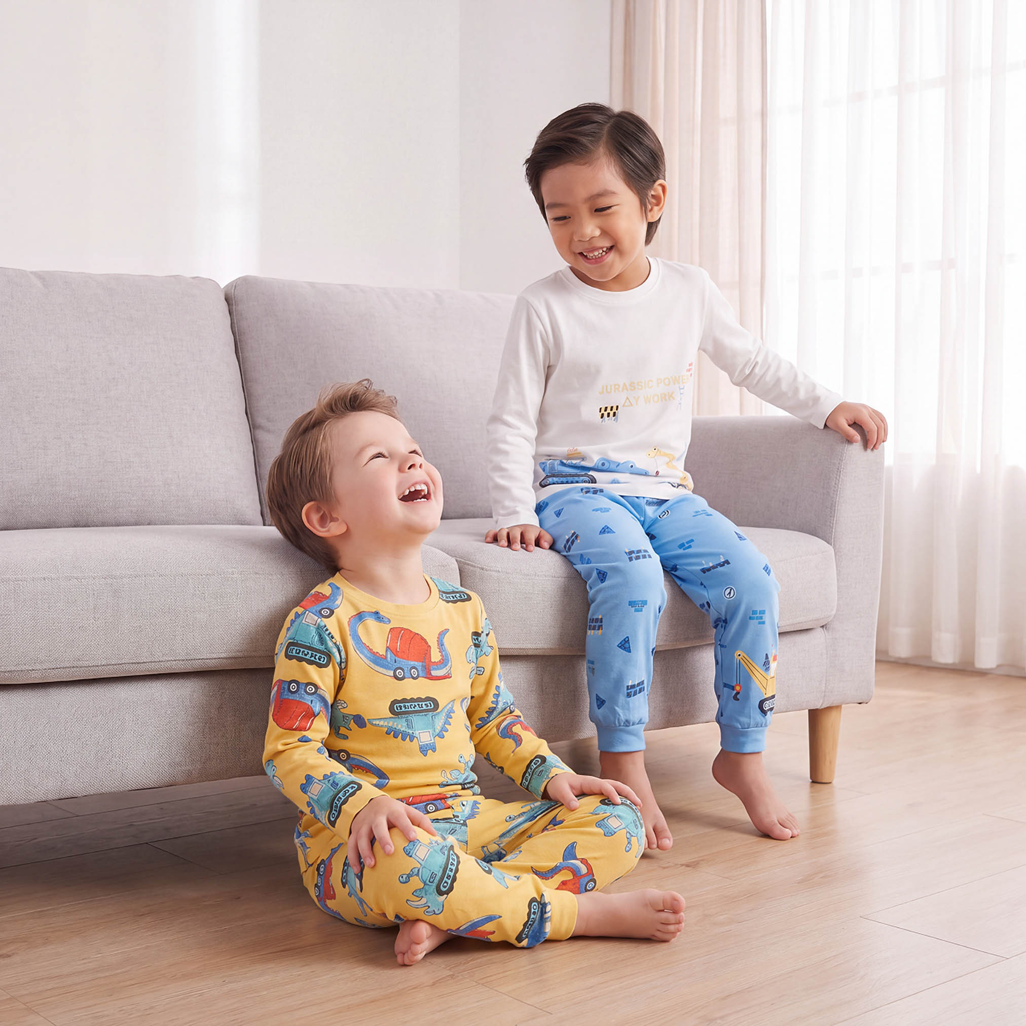 طقم بيجاما قطن بطبعات ديناصور وجرار وياقة ضيقة وأكمام طويلة من جونيورز - عبوة من طقمين-boys-clothing-nightwear-image-1