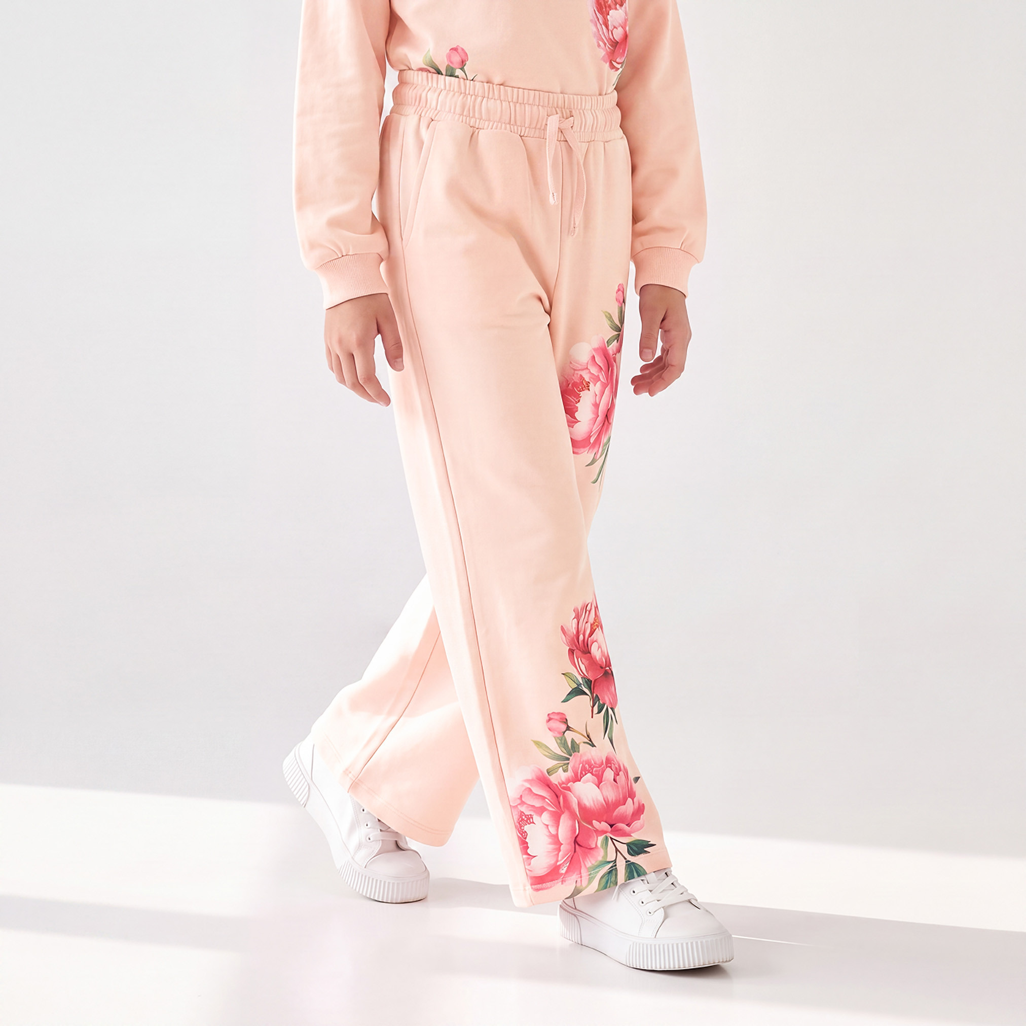 بنطلون رياضي بخصر مطاطي ورباط وطبعات زهرية-girls-clothing-bottoms-joggersandtrackpants-image-1